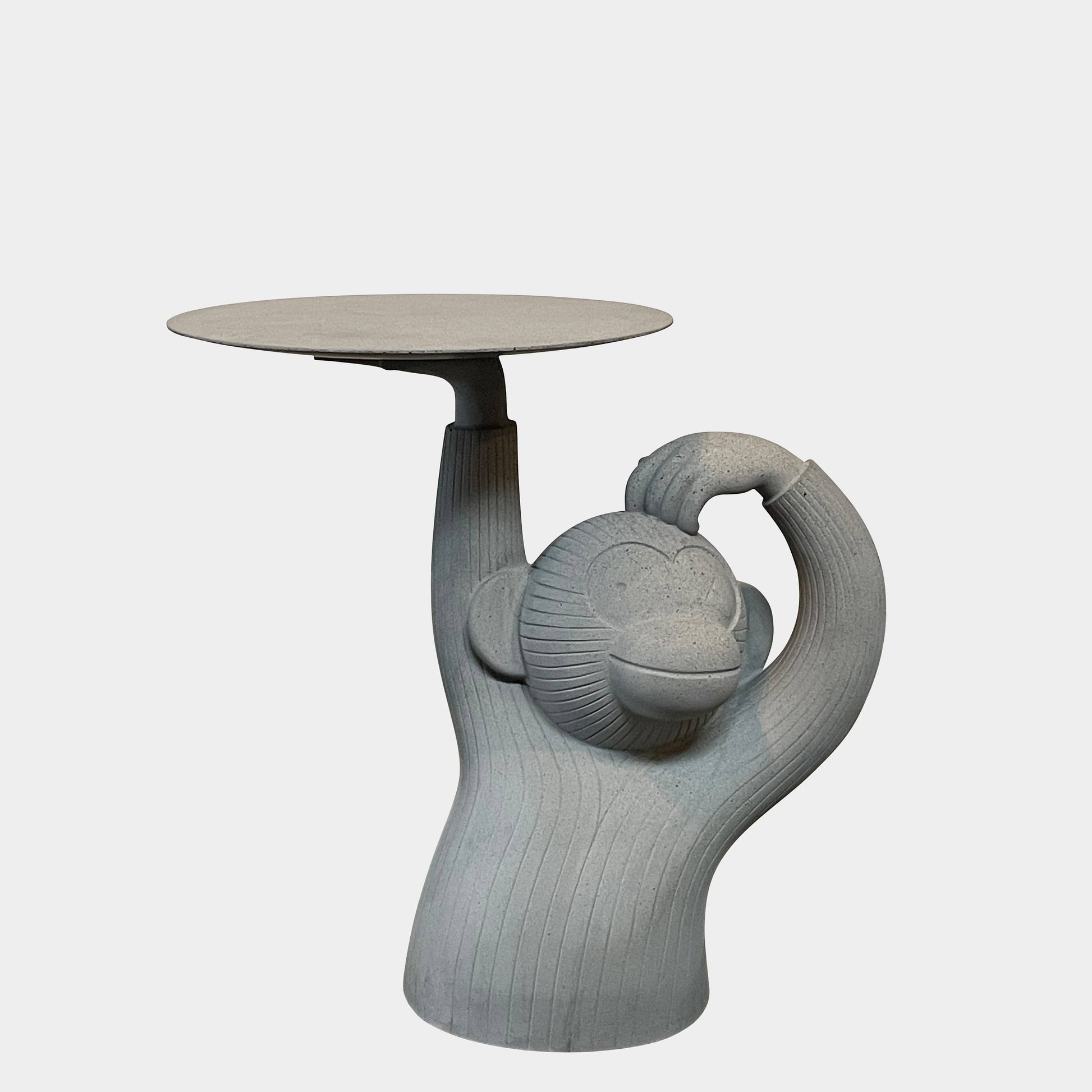 A BD Barcelona Monkey Side Table placed on top of a table.
