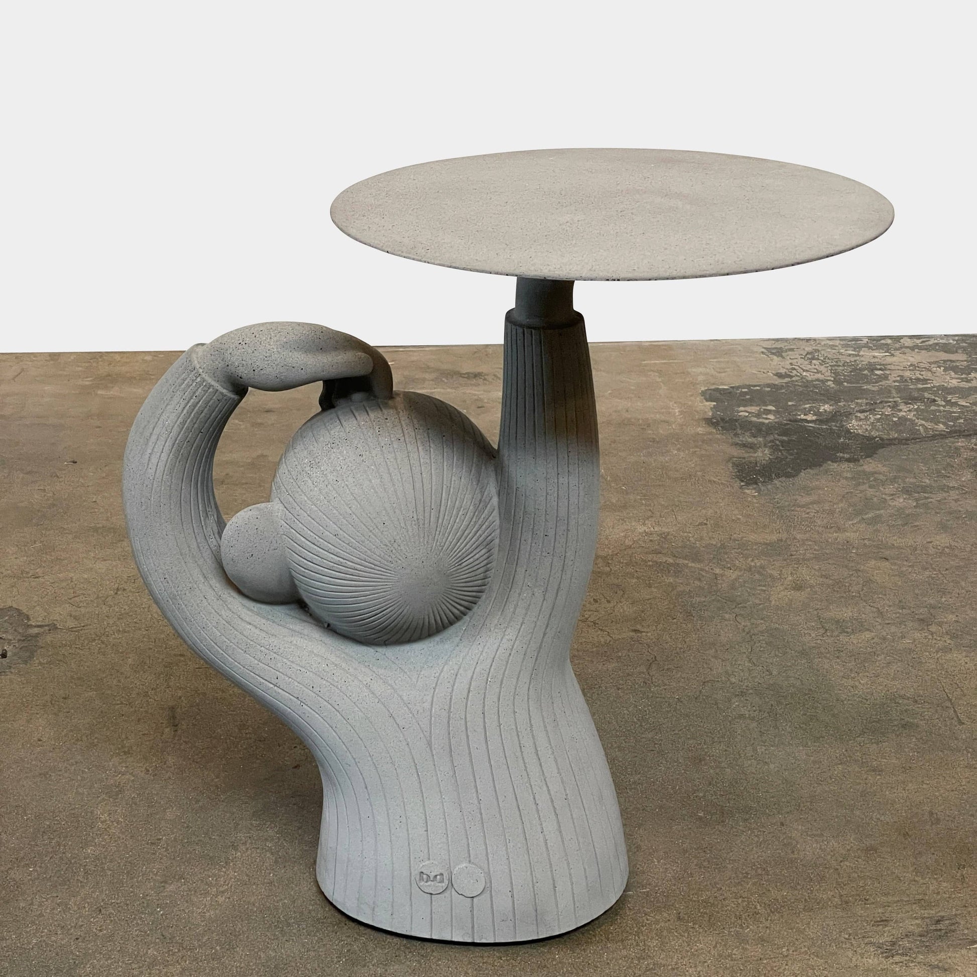 A BD Barcelona Monkey Side Table placed on top of a table.