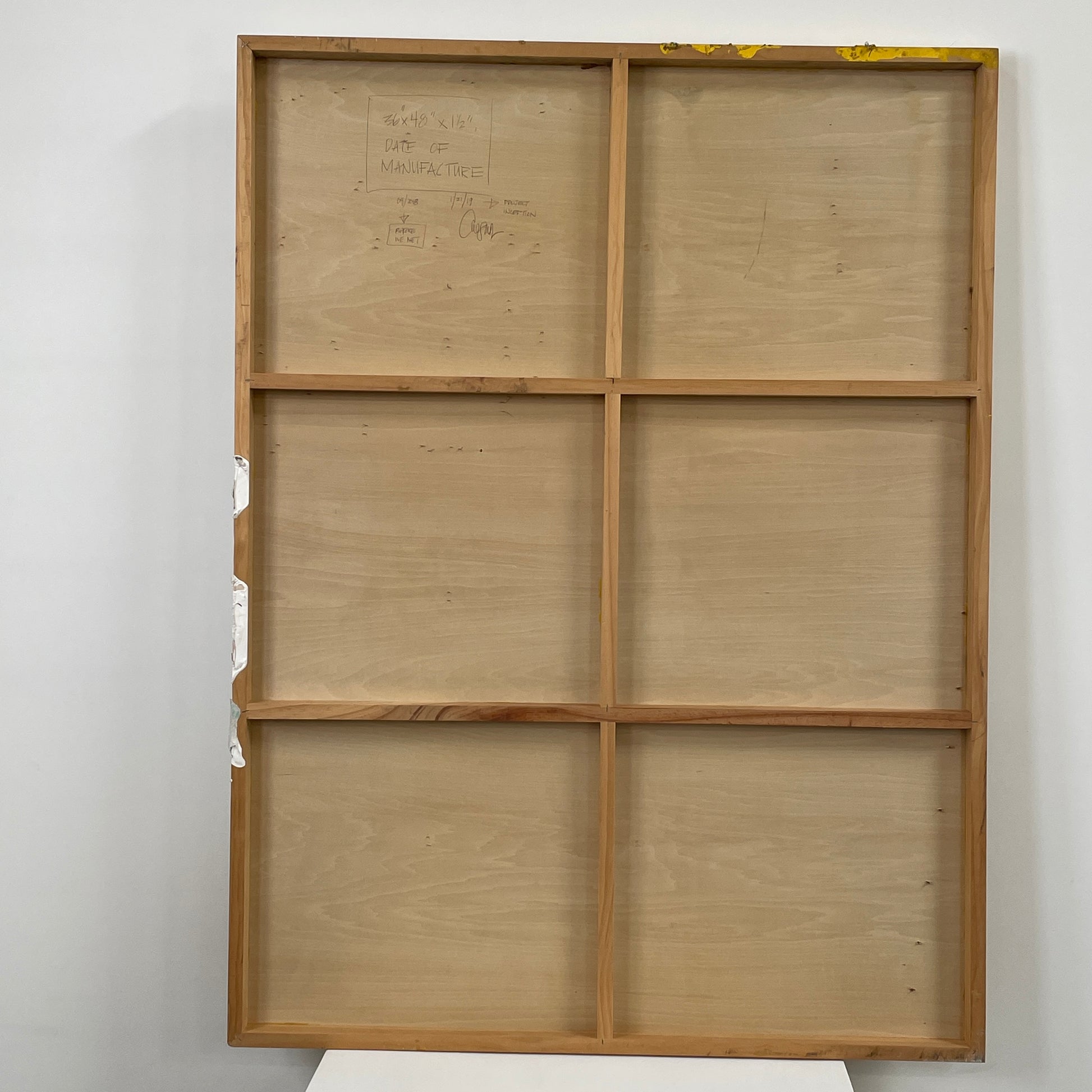 The diptych "Before We Met" by Allison Caesar displays a masterful mixed media technique: the left panel features intricately detailed gray, white, and yellow circles, while the right panel offers dynamic textures as yellow paint interacts with torn paper on a textured surface.