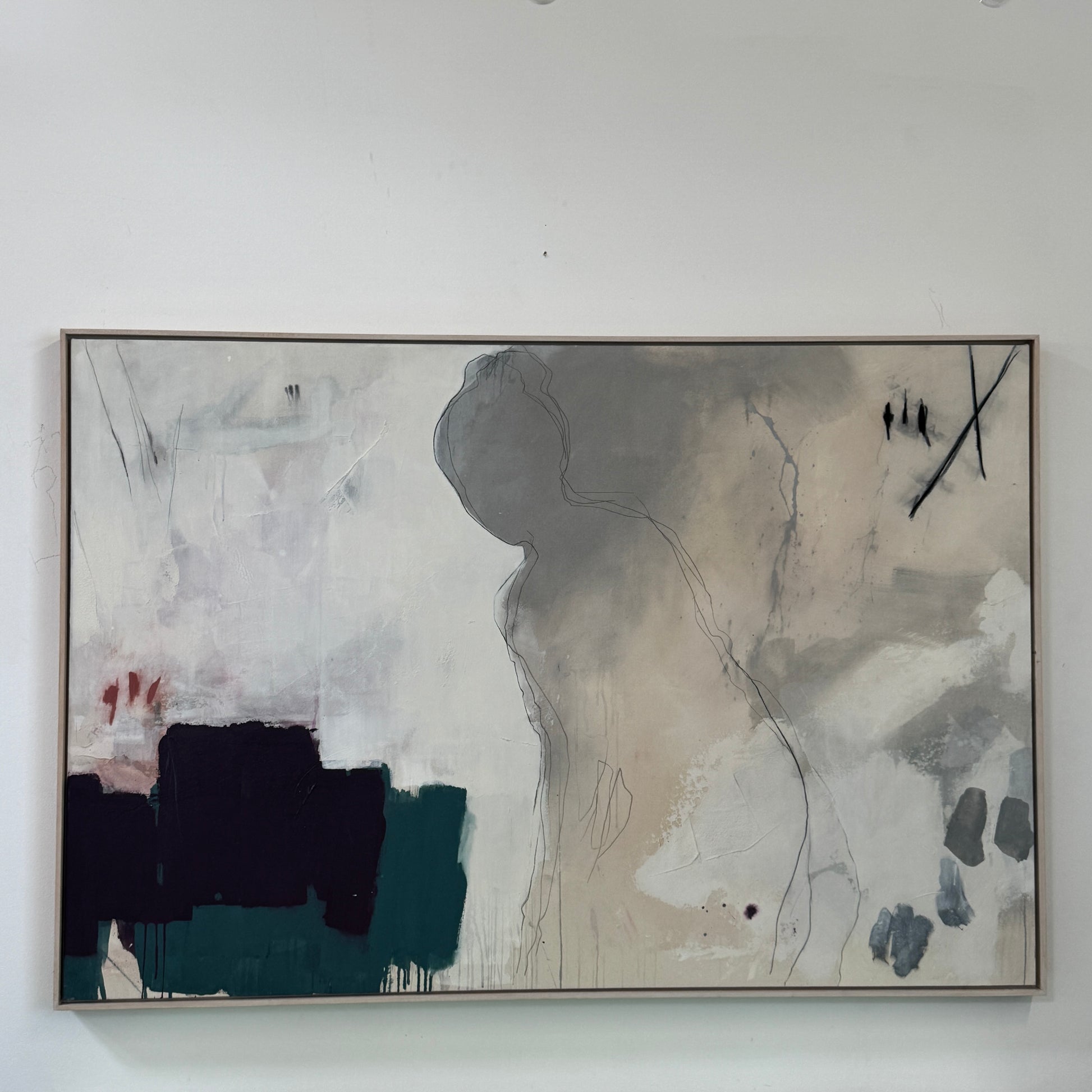 Painting: by Melissa Harrington from Artist showcases textured brushstrokes, a subtle human figure, blocks of dark green and black, with splashes of red and blue on a primarily white and beige background.