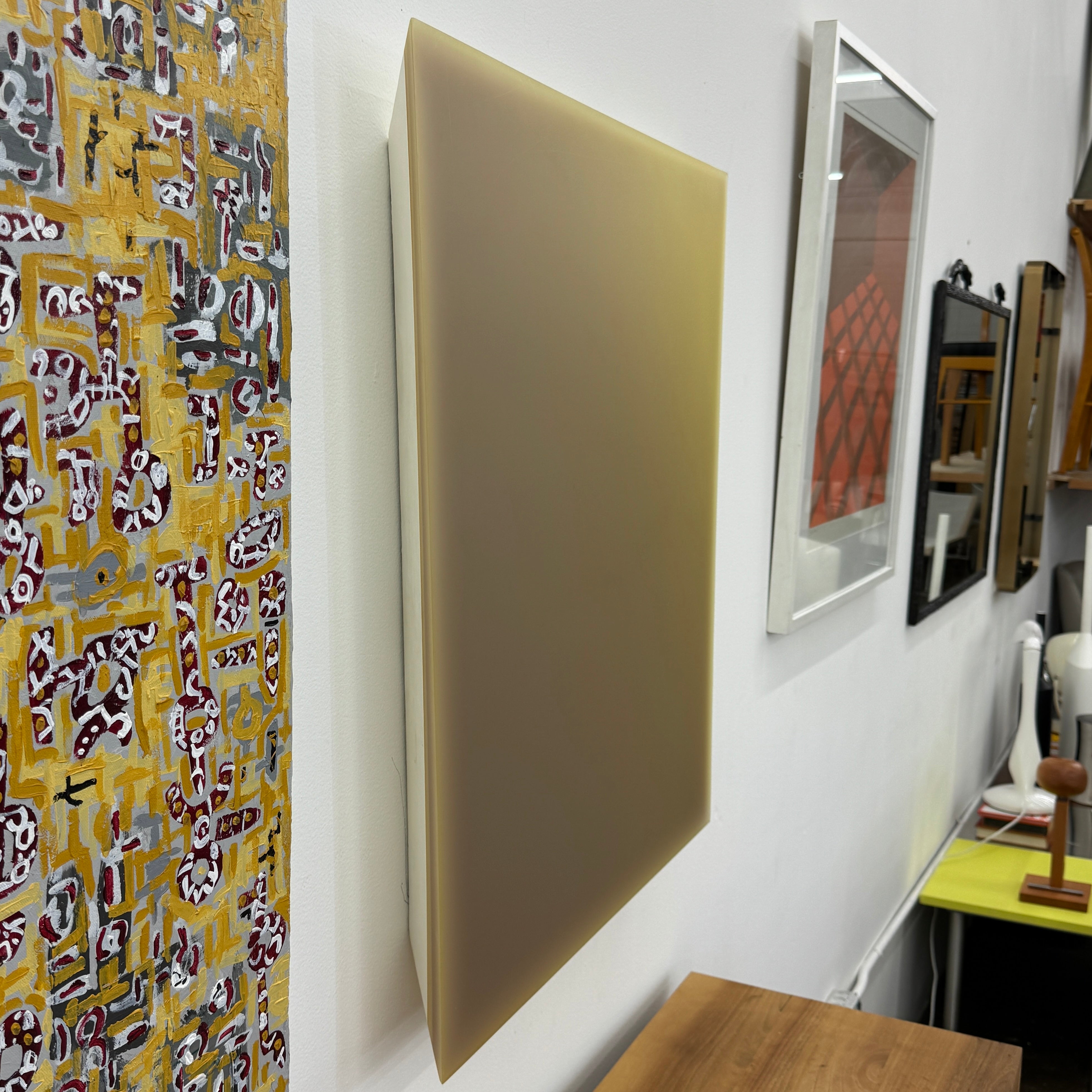 A single, irregularly shaped, flat sheet of yellowish-brown material—echoing Artist’s Painting: Gradient #8 Lisa Bartelson—is displayed against a white background.