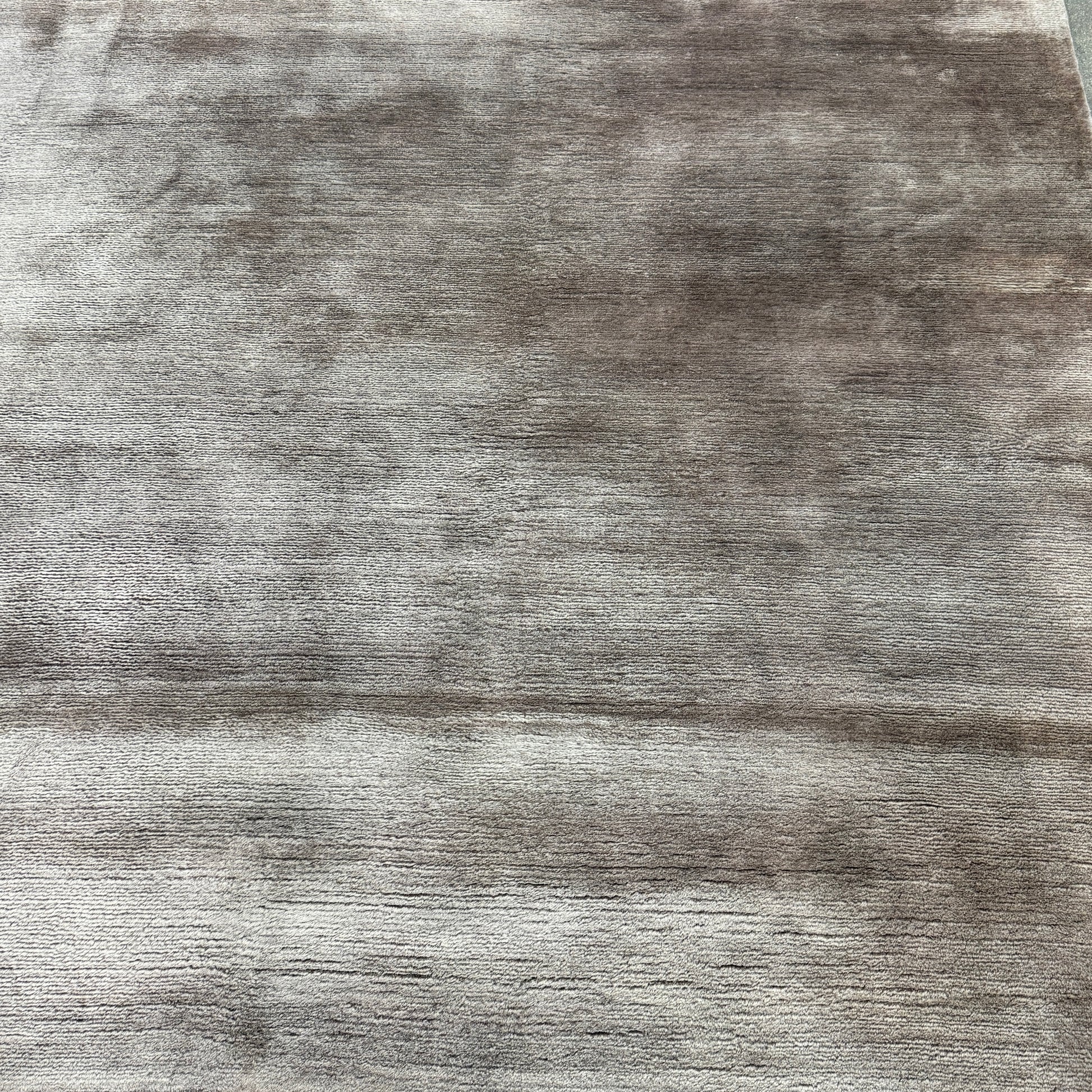 The Rug Company Mohair Rug 9' x 12' is a rectangular, grey gradient hand-knotted rug with a subtly uneven surface, shown laid flat on a white background.