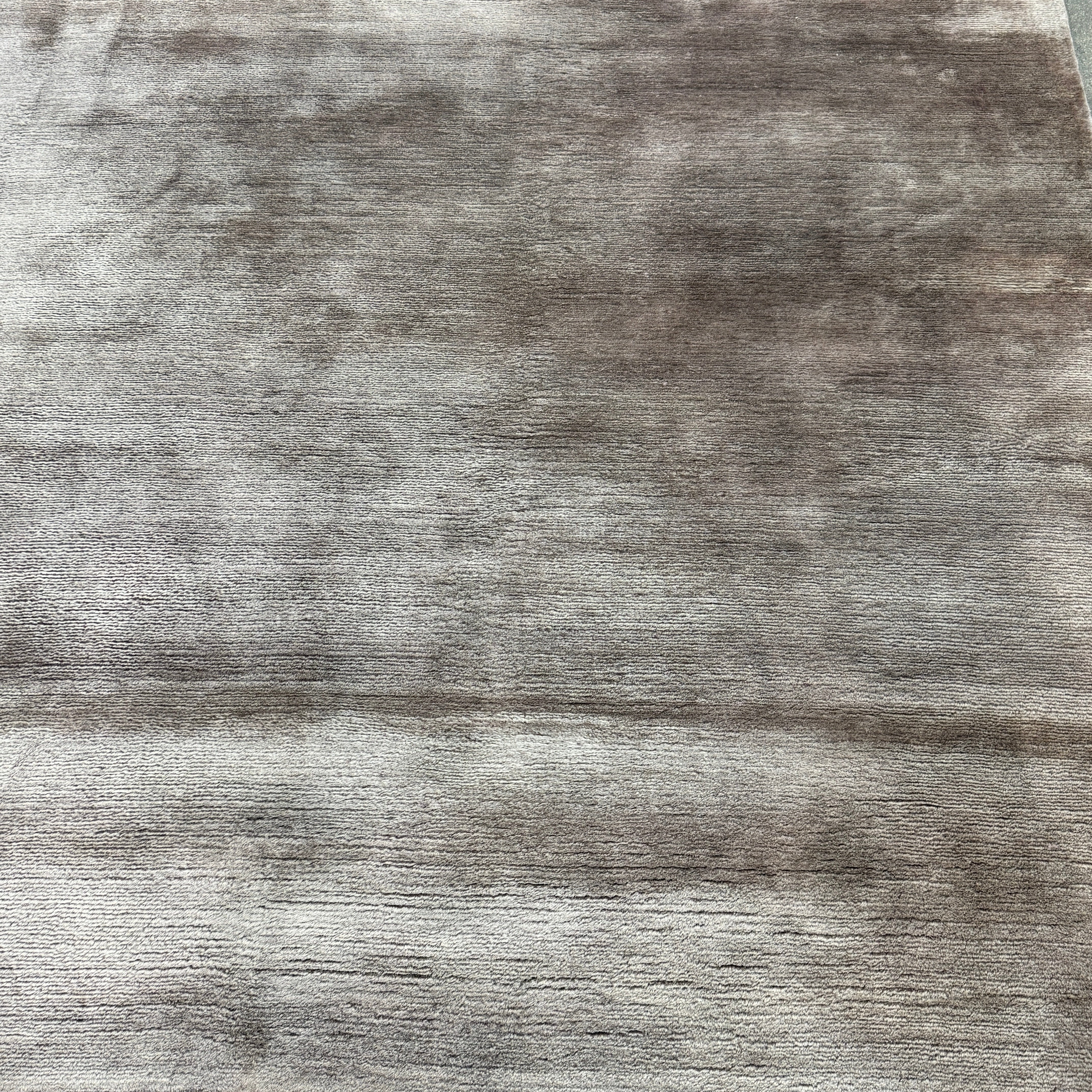 The Rug Company Mohair Rug 9' x 12' is a rectangular, grey gradient hand-knotted rug with a subtly uneven surface, shown laid flat on a white background.