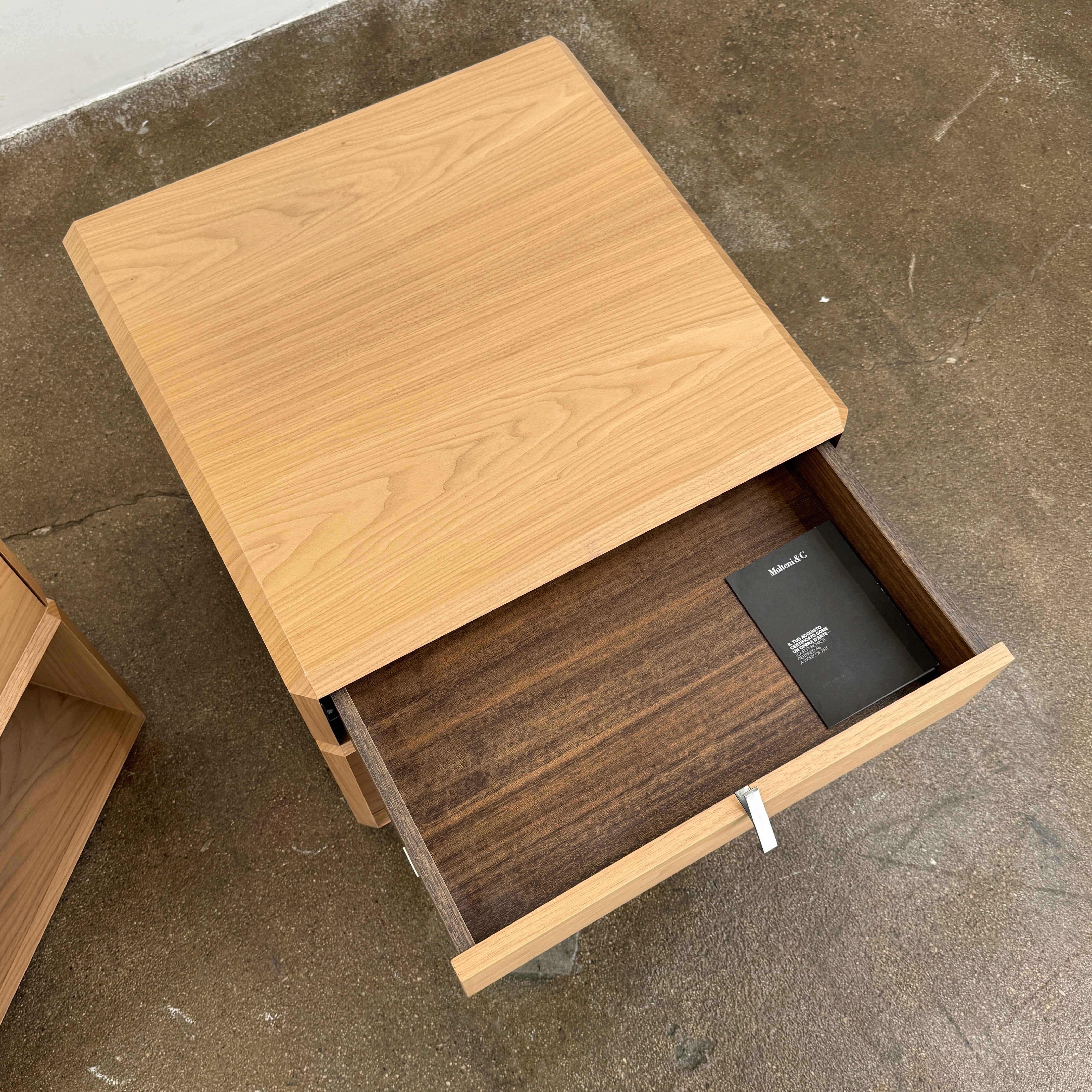 The Molteni & C Teorema Nightstands Set of 2 features modern walnut design with open shelves, a single upper drawer with a sleek metal handle—an elegant bedroom furniture choice from Molteni & C.