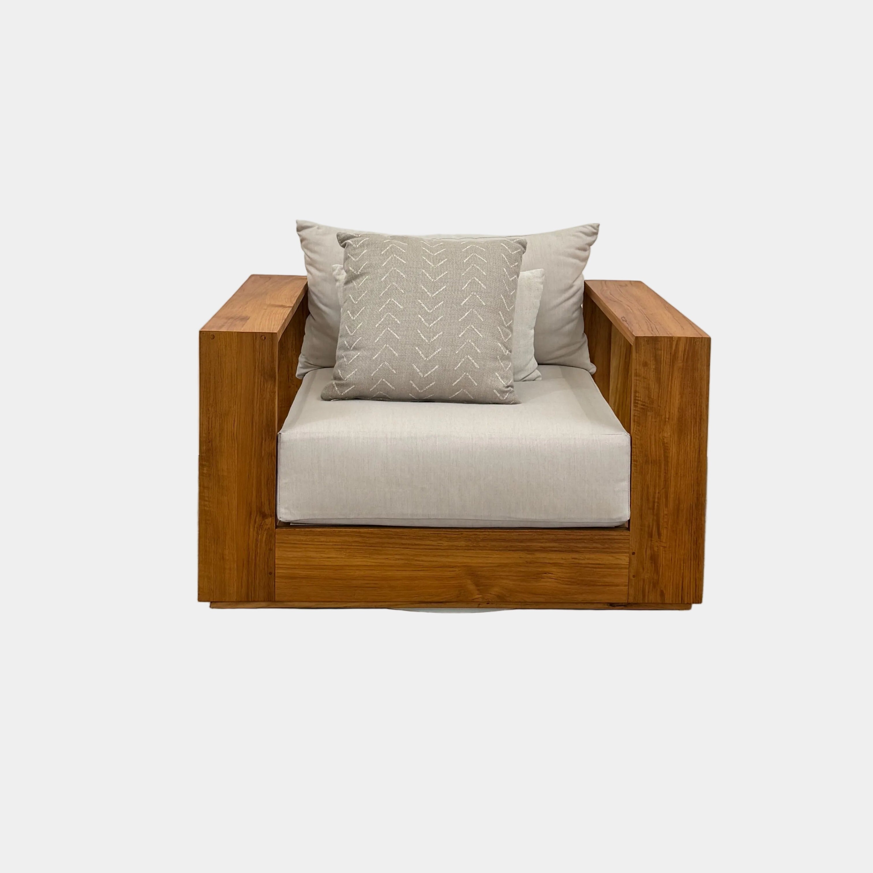 The Harbour Hayman Teak Outdoor Swivel Lounge Chair by Harbour features a modern design with a light beige cushion and a black-and-white patterned throw pillow, shown against a plain white background.