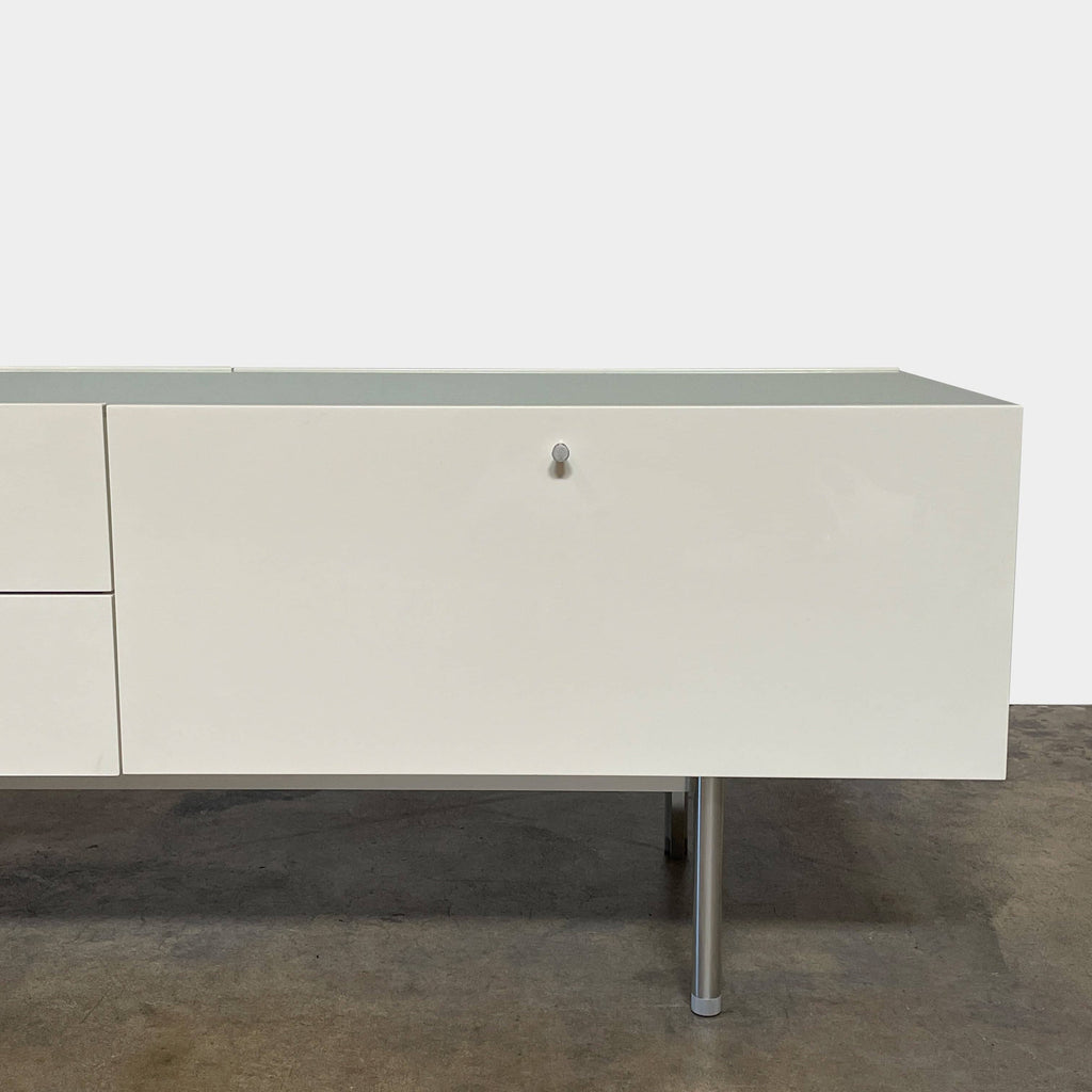 Cassina 255-256 Flat Sideboard - a white lacquer sideboard with a red sticker on it.