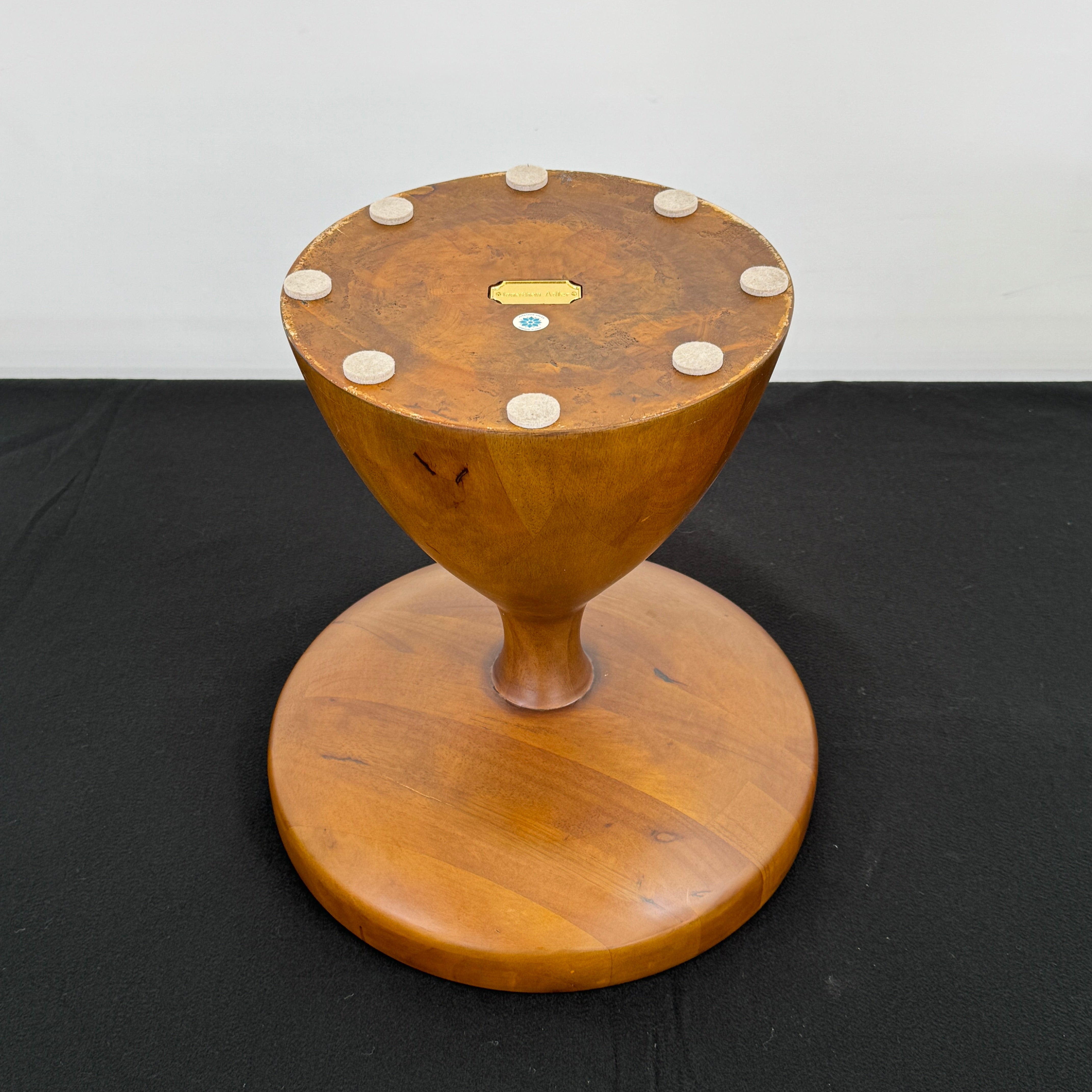 The Jonathan Adler Buenos Aires Side Table features a small round marble top and a sturdy wooden base, shown against a plain white background.