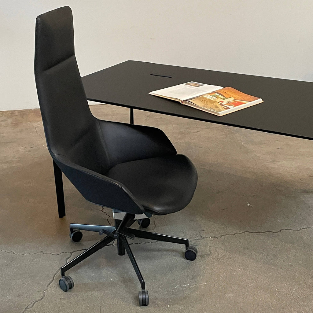 An Arper Aston Executive Office Chair with wheels.