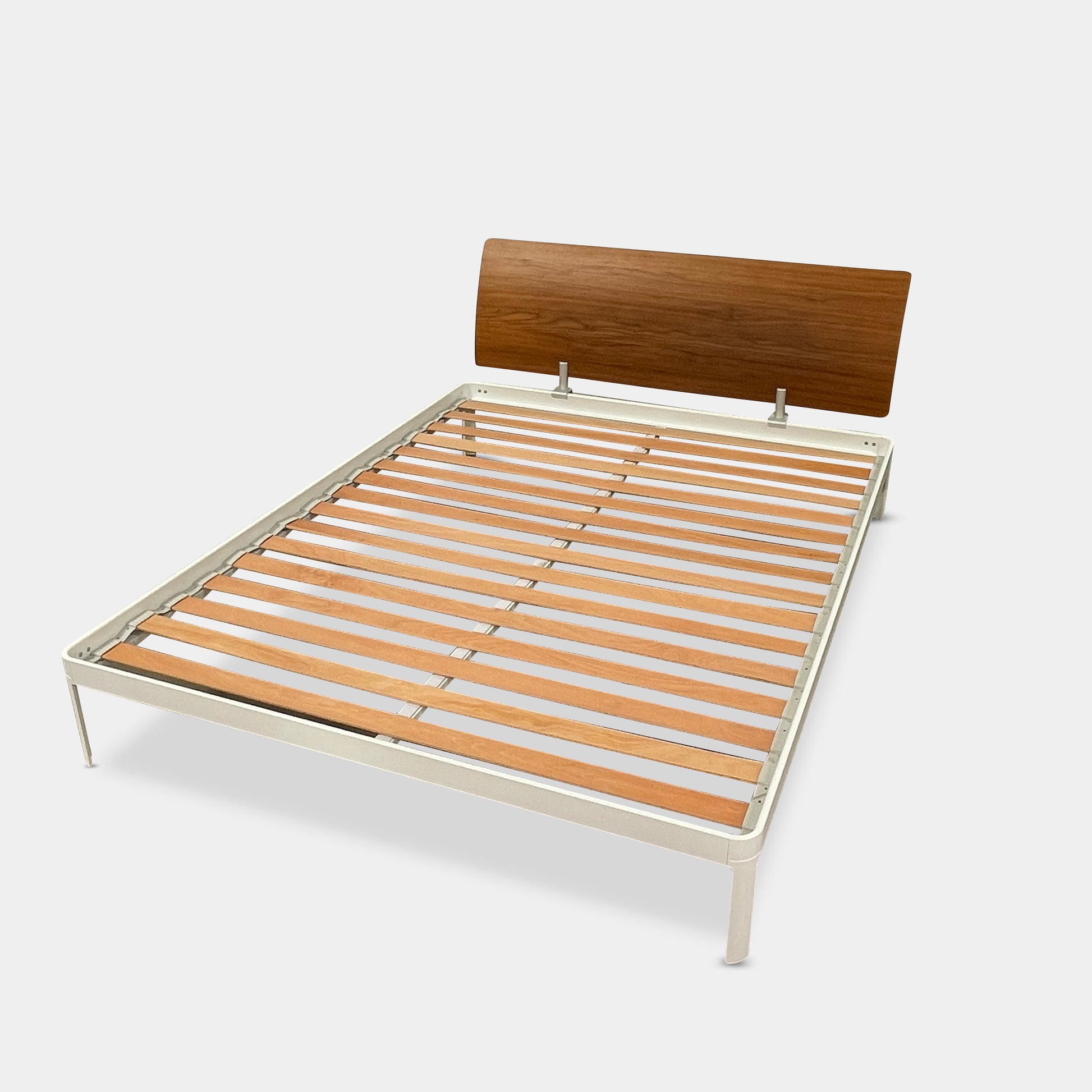 The DWR Min Queen Size Bed by Luciano Bertoncini showcases a metal frame with a sophisticated wooden headboard and slatted wooden base, elegantly placed against a plain white background.