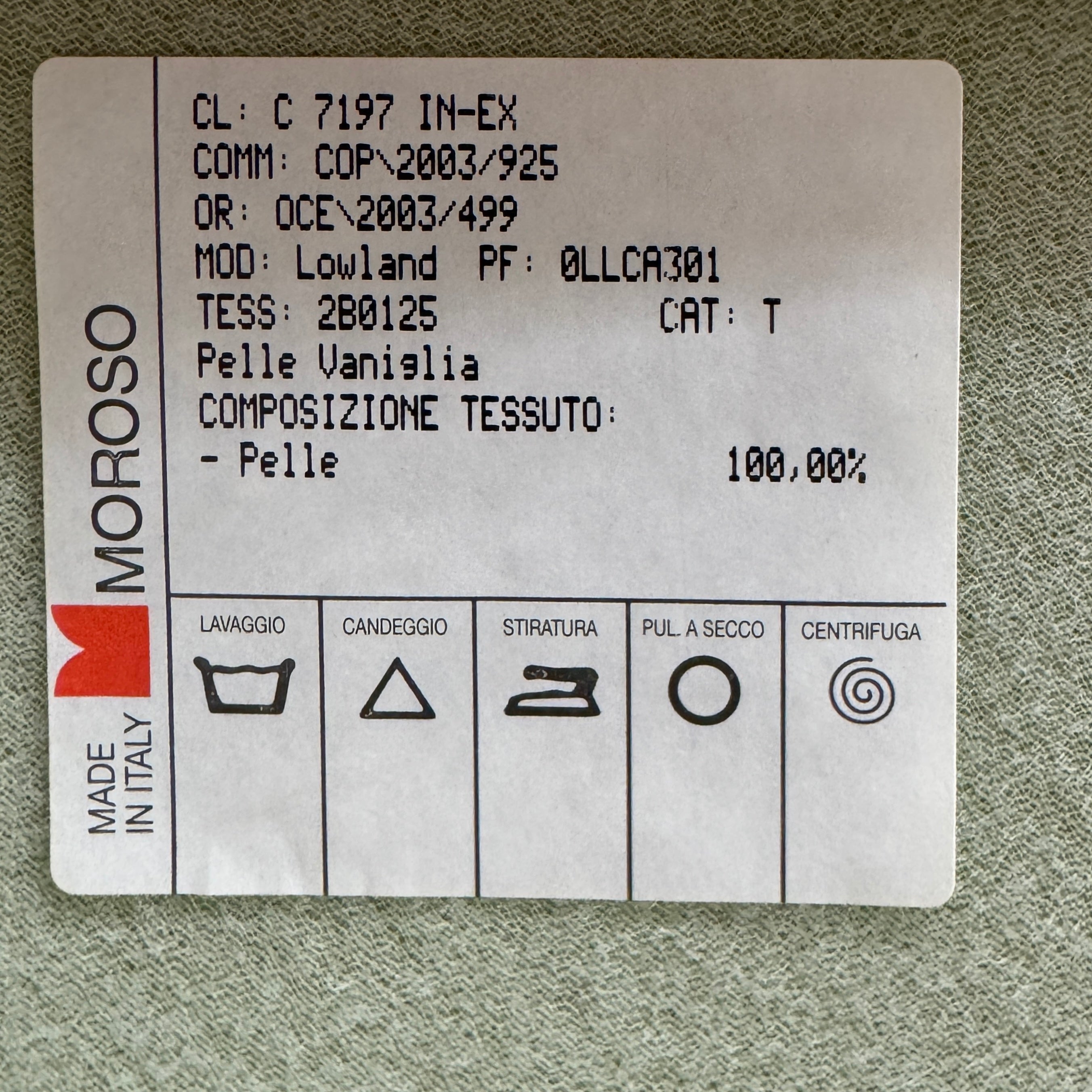 The Moroso Lowland Sectional Sofa by Moroso features beige leather, a low backrest, wide armrests, and a right-side chaise lounge inspired by Patricia Urquiola’s modern design, set against a plain white background.