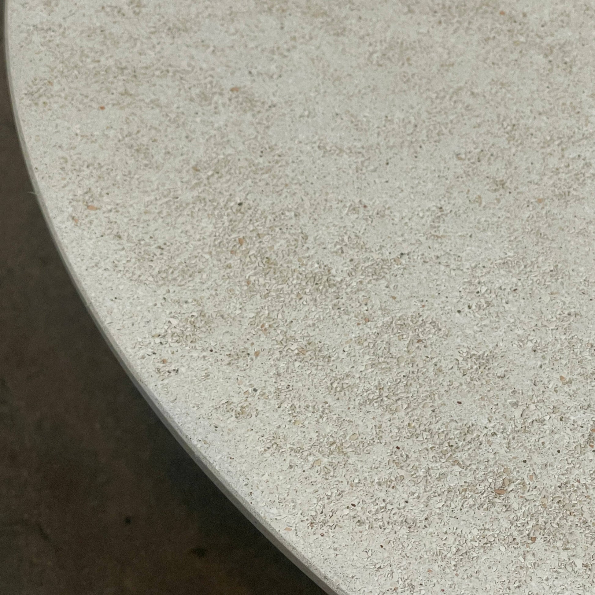 An adjustable-height Paola Lenti Giro Outdoor Side Table for outdoor living, displayed on a white background.