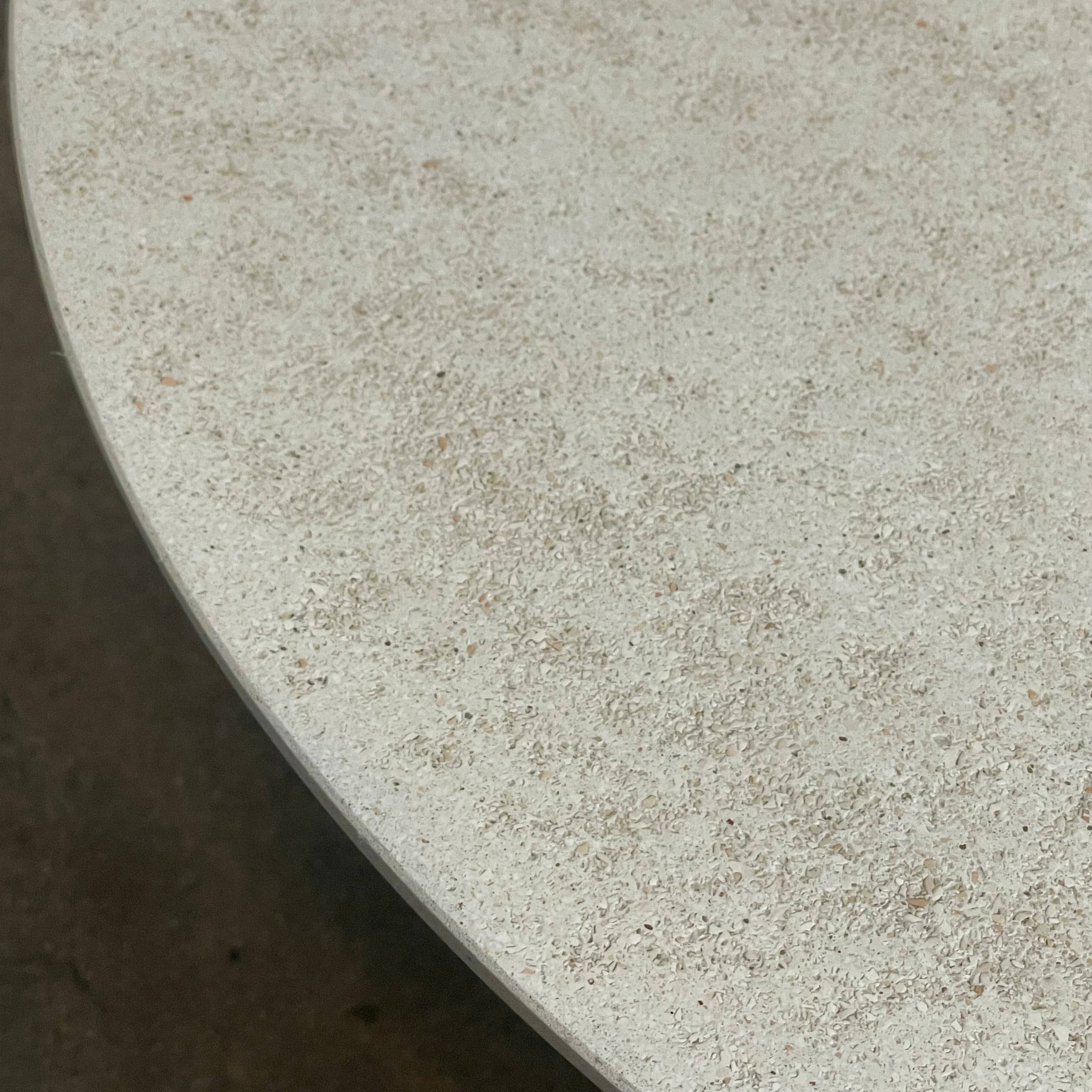 An adjustable-height Paola Lenti Giro Outdoor Side Table for outdoor living, displayed on a white background.