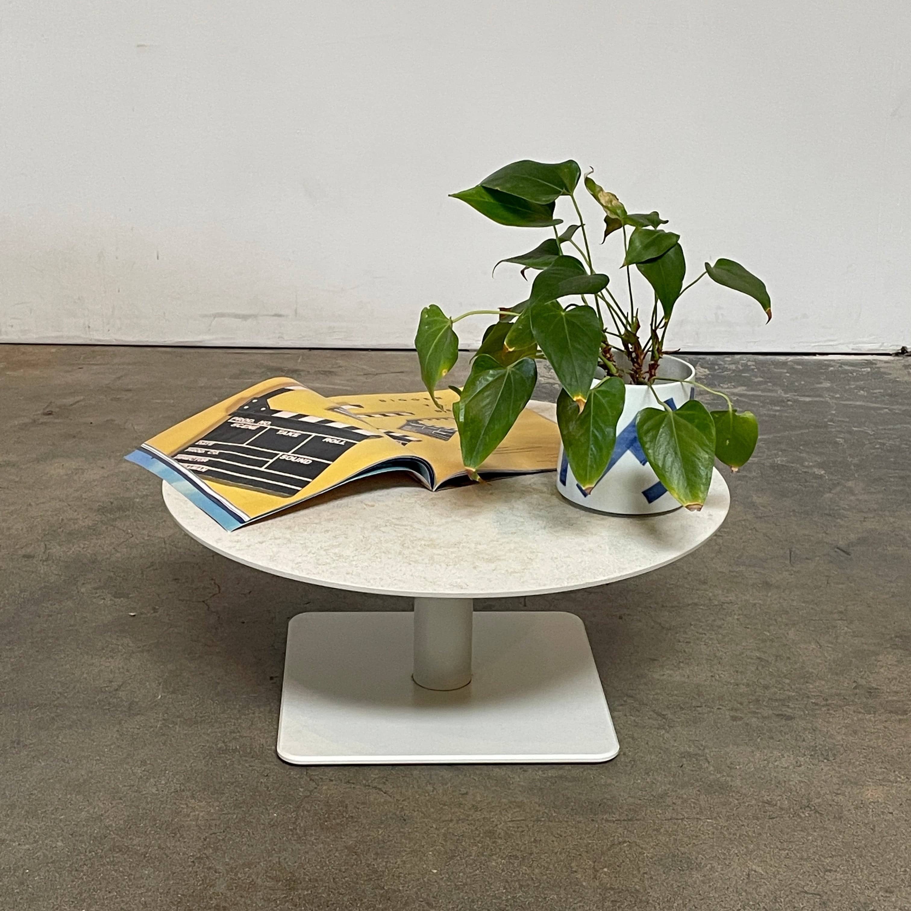 An adjustable-height Paola Lenti Giro Outdoor Side Table for outdoor living, displayed on a white background.