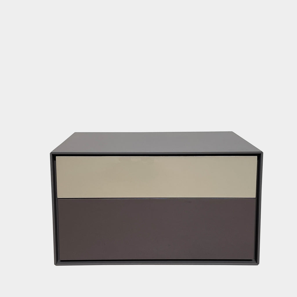 Two black B&B Italia Dado Nightstands with a modern touch on a white background.