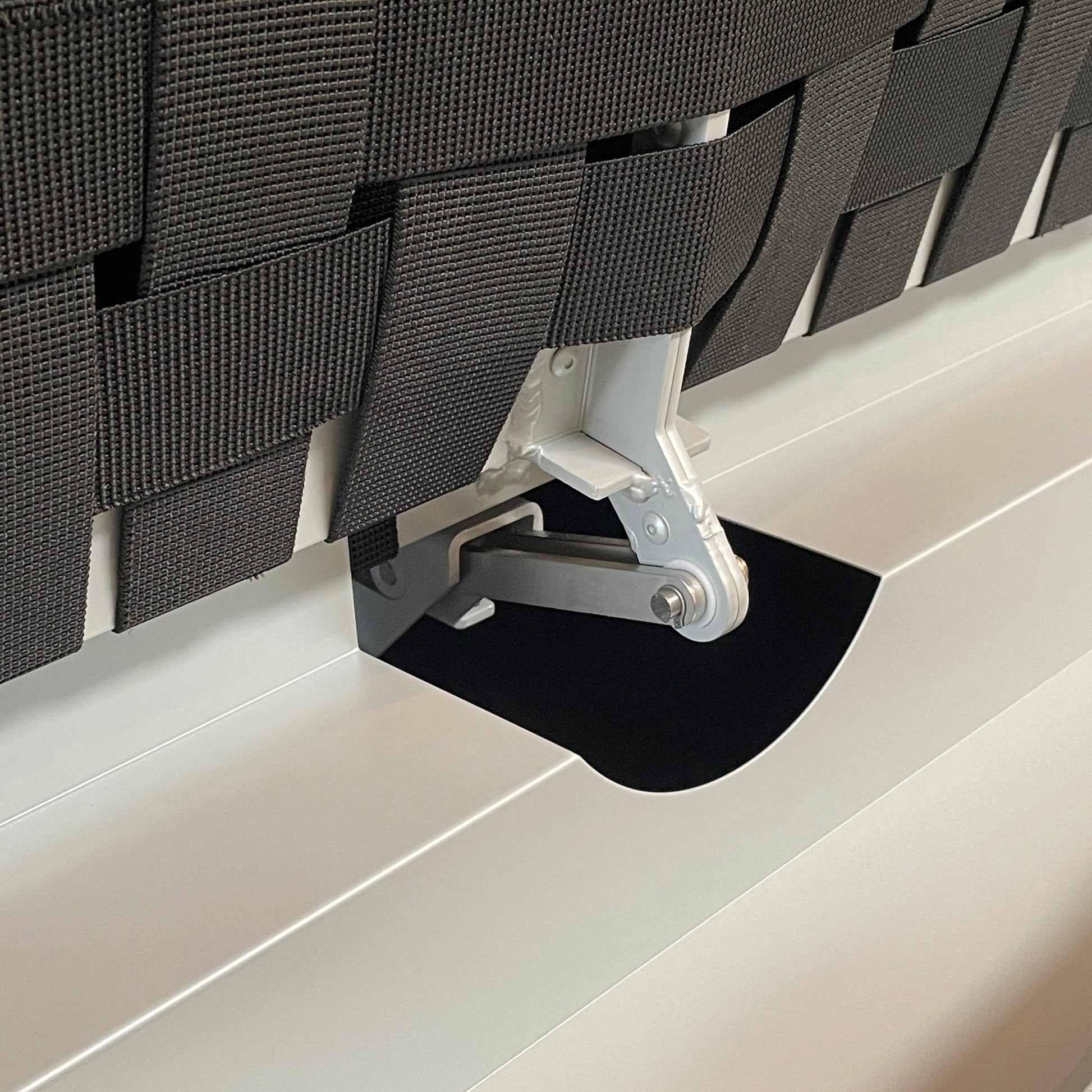 An adjustable white Paola Lenti Cove Double Sunbed by Paola Lenti features two separate reclining mattresses and matching pillows, perfect for outdoor lounging.