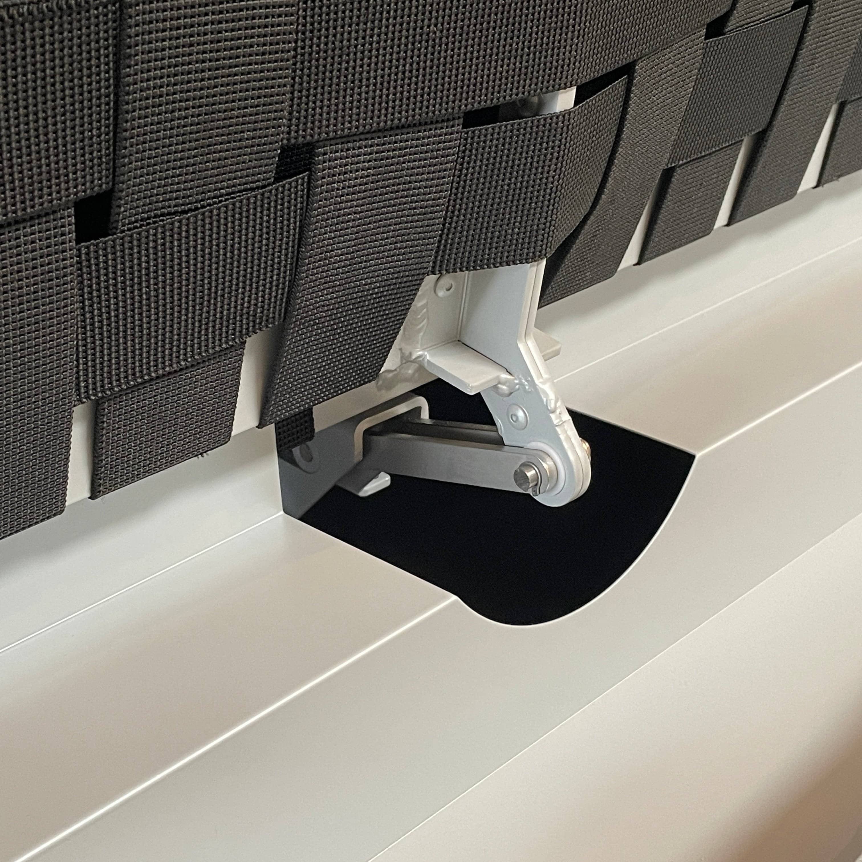 An adjustable white Paola Lenti Cove Double Sunbed by Paola Lenti features two separate reclining mattresses and matching pillows, perfect for outdoor lounging.