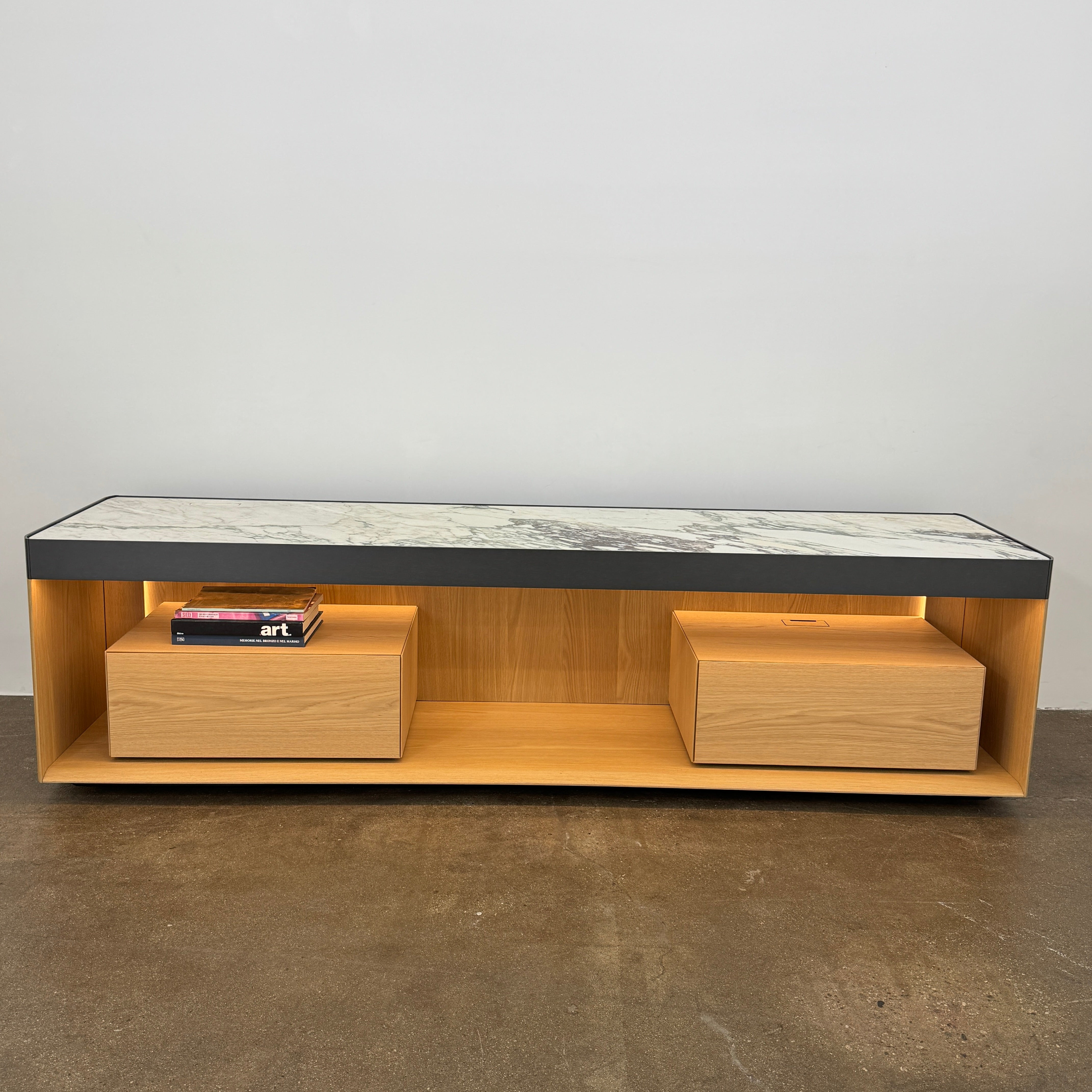 Enhance your home with the Molteni & C Living Box Console—a modern wooden piece with a marble top, two drawers, and open storage for books. Inspired by luxury furniture from Molteni & C, it works as both a coffee table and designer console.