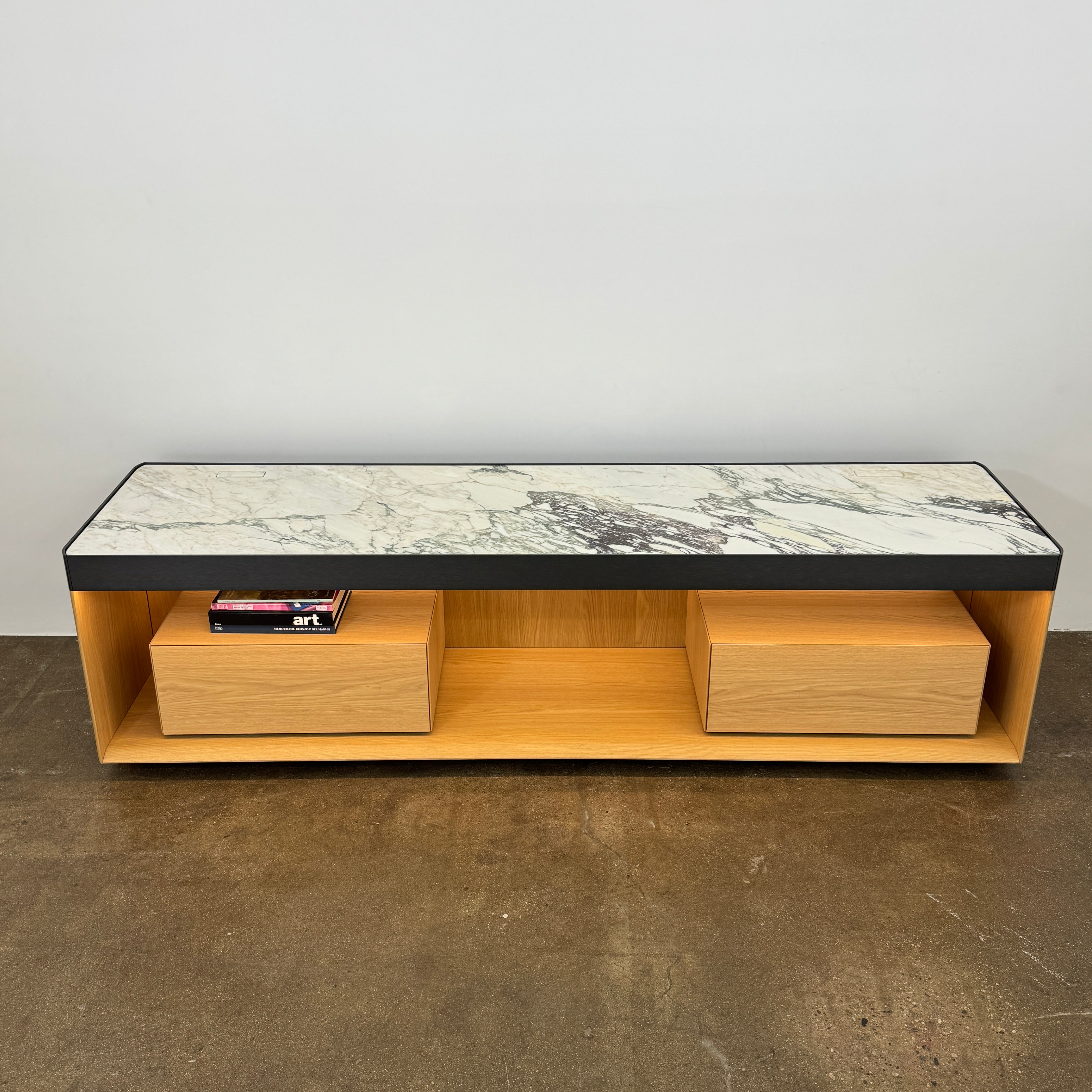 Enhance your home with the Molteni & C Living Box Console—a modern wooden piece with a marble top, two drawers, and open storage for books. Inspired by luxury furniture from Molteni & C, it works as both a coffee table and designer console.