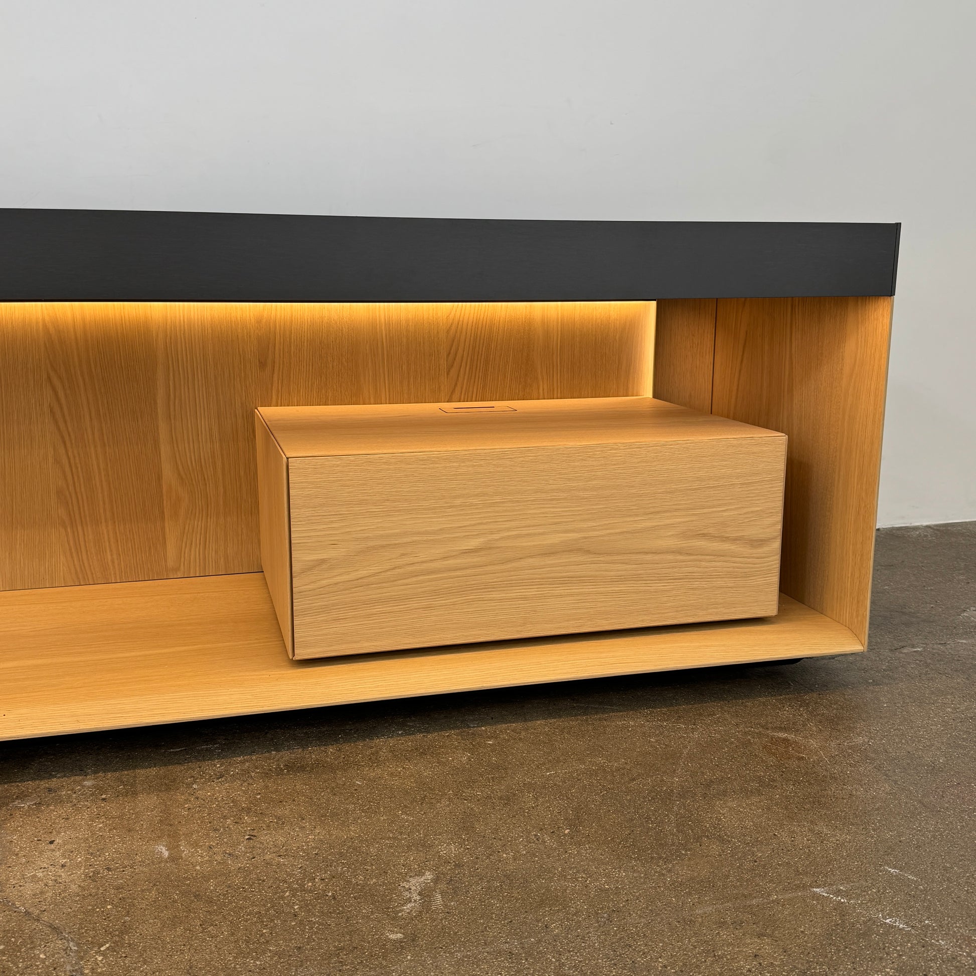 Enhance your home with the Molteni & C Living Box Console—a modern wooden piece with a marble top, two drawers, and open storage for books. Inspired by luxury furniture from Molteni & C, it works as both a coffee table and designer console.