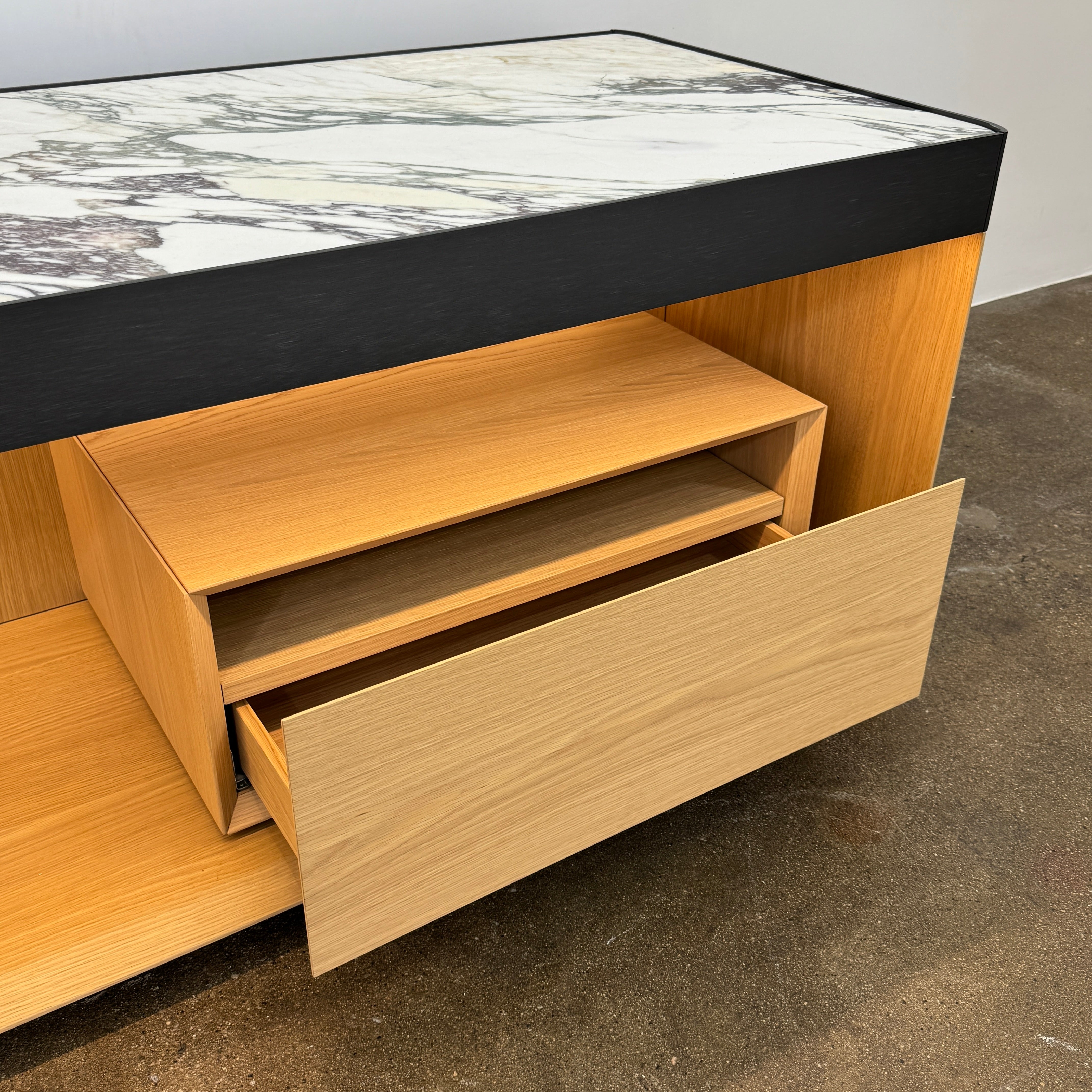 Enhance your home with the Molteni & C Living Box Console—a modern wooden piece with a marble top, two drawers, and open storage for books. Inspired by luxury furniture from Molteni & C, it works as both a coffee table and designer console.