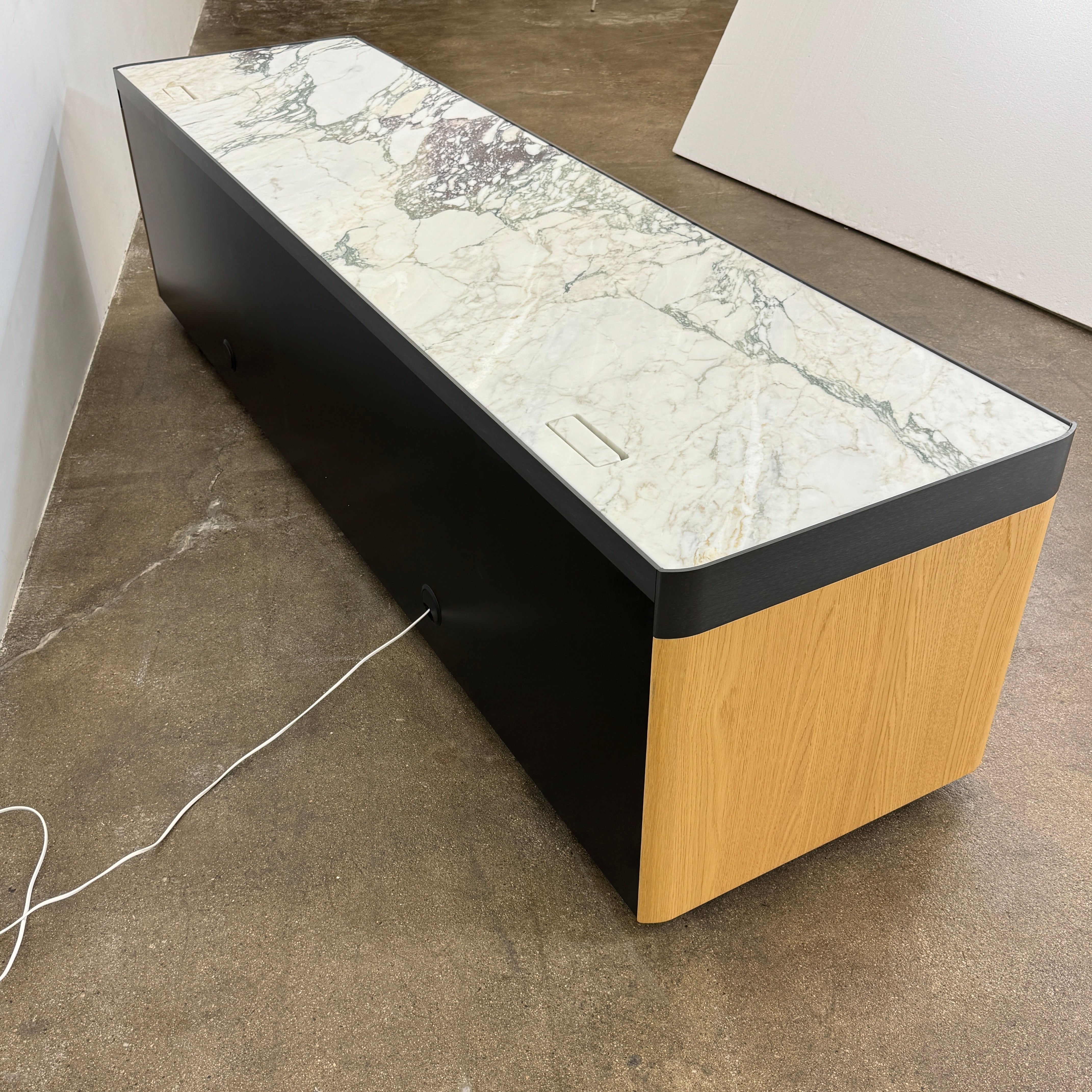 Enhance your home with the Molteni & C Living Box Console—a modern wooden piece with a marble top, two drawers, and open storage for books. Inspired by luxury furniture from Molteni & C, it works as both a coffee table and designer console.