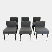 Set of 6 Maxalto Dining Eunice Chairs by Maxalto, featuring gray upholstery and sleek metal legs, arranged in two rows against a plain white background.