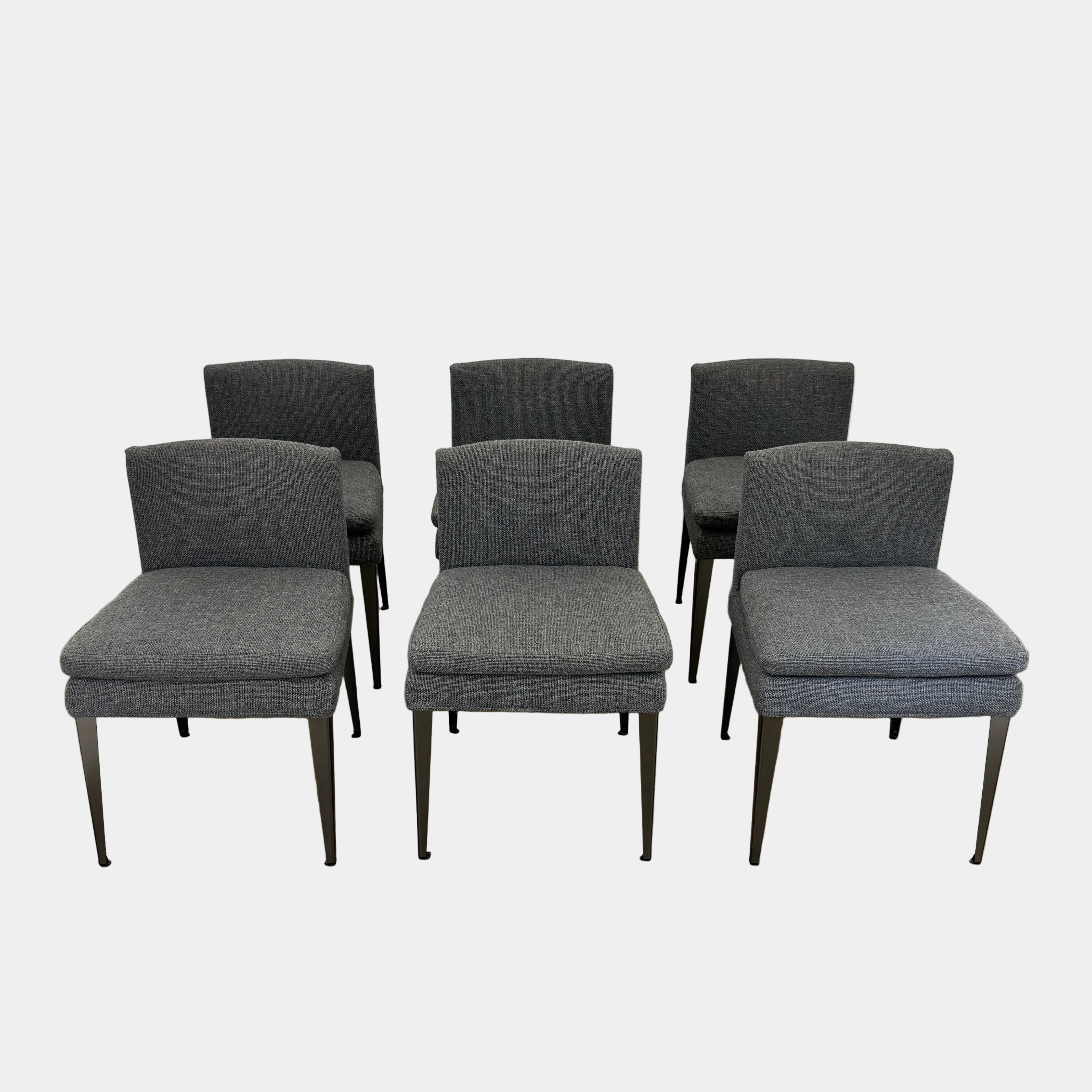 Set of 6 Maxalto Dining Eunice Chairs by Maxalto, featuring gray upholstery and sleek metal legs, arranged in two rows against a plain white background.