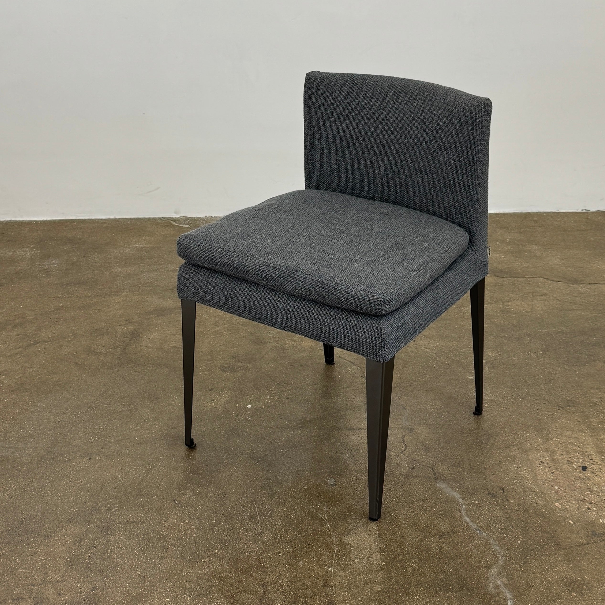 Set of 6 Maxalto Dining Eunice Chairs by Maxalto, featuring gray upholstery and sleek metal legs, arranged in two rows against a plain white background.