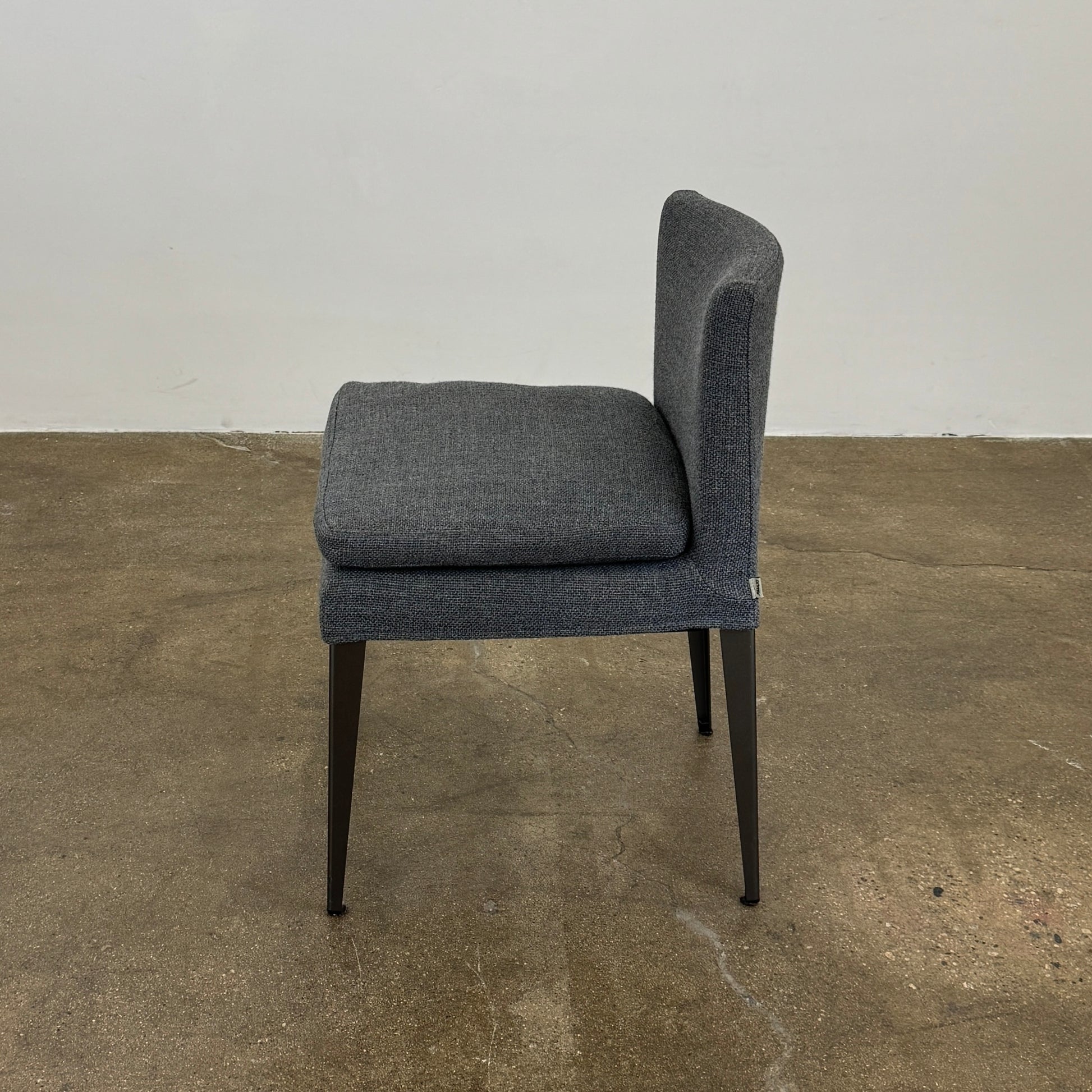 Set of 6 Maxalto Dining Eunice Chairs by Maxalto, featuring gray upholstery and sleek metal legs, arranged in two rows against a plain white background.