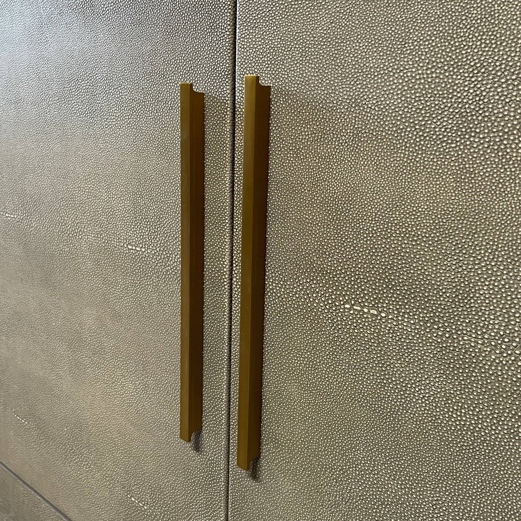 A modern Restoration Hardware Graydon Shagreen Four Door Sideboard with brass handles and legs.