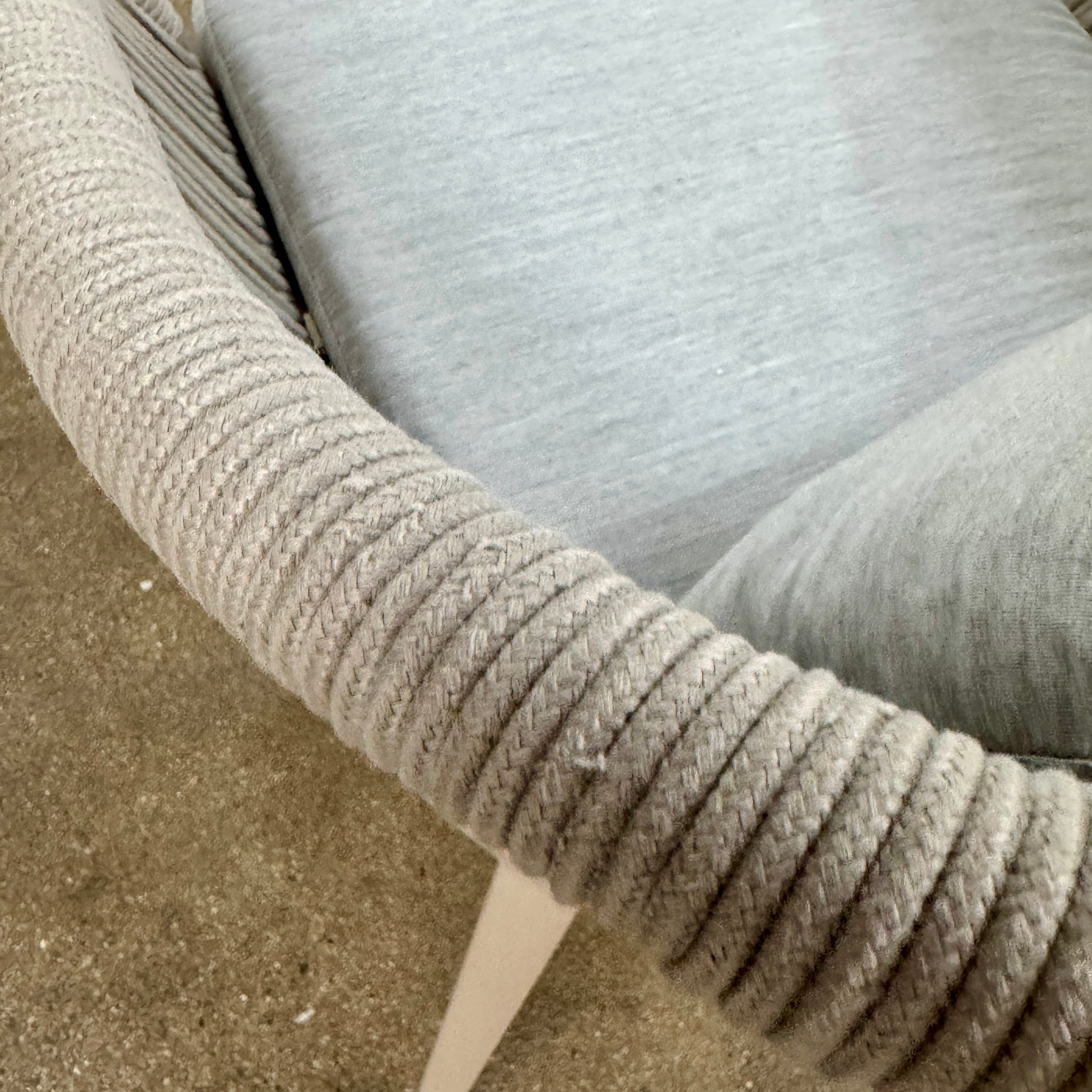 Six Harbour Hamilton Outdoor Dining Chairs by Harbour, featuring a beige woven design with light cushions, are arranged in two rows of three on a plain light background.