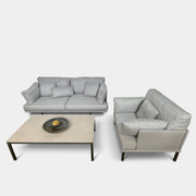 Two light gray sofas from the Point 1920 Long Island Outdoor Seating Set, featuring matching cushions and GOOD SIDE slat suspension, are arranged around a rectangular coffee table on a plain white background.
