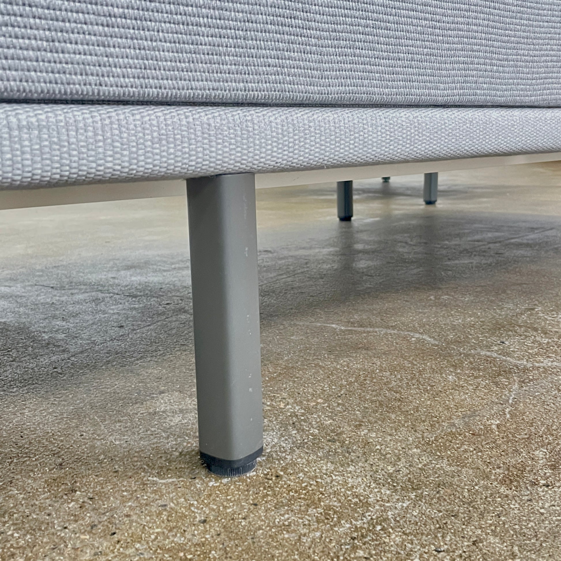 Two light gray sofas from the Point 1920 Long Island Outdoor Seating Set, featuring matching cushions and GOOD SIDE slat suspension, are arranged around a rectangular coffee table on a plain white background.