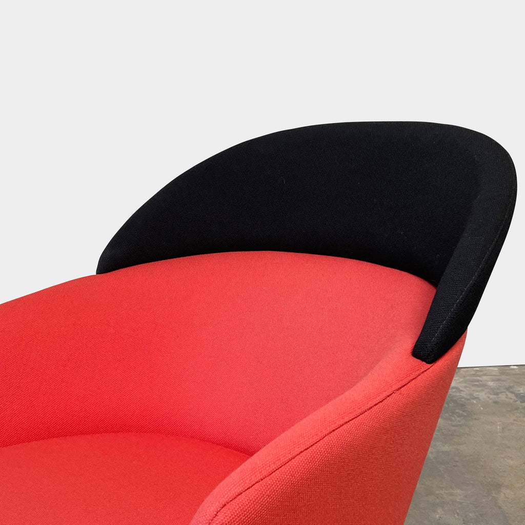 A Bross Wam Lounge Chair with black legs.