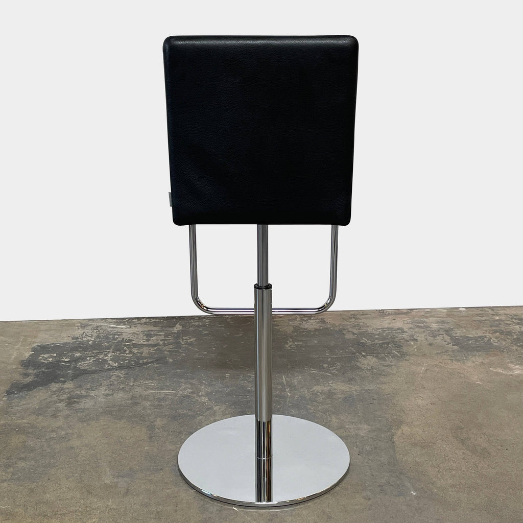 A Walter Knoll Jason bar stool on a chrome base.