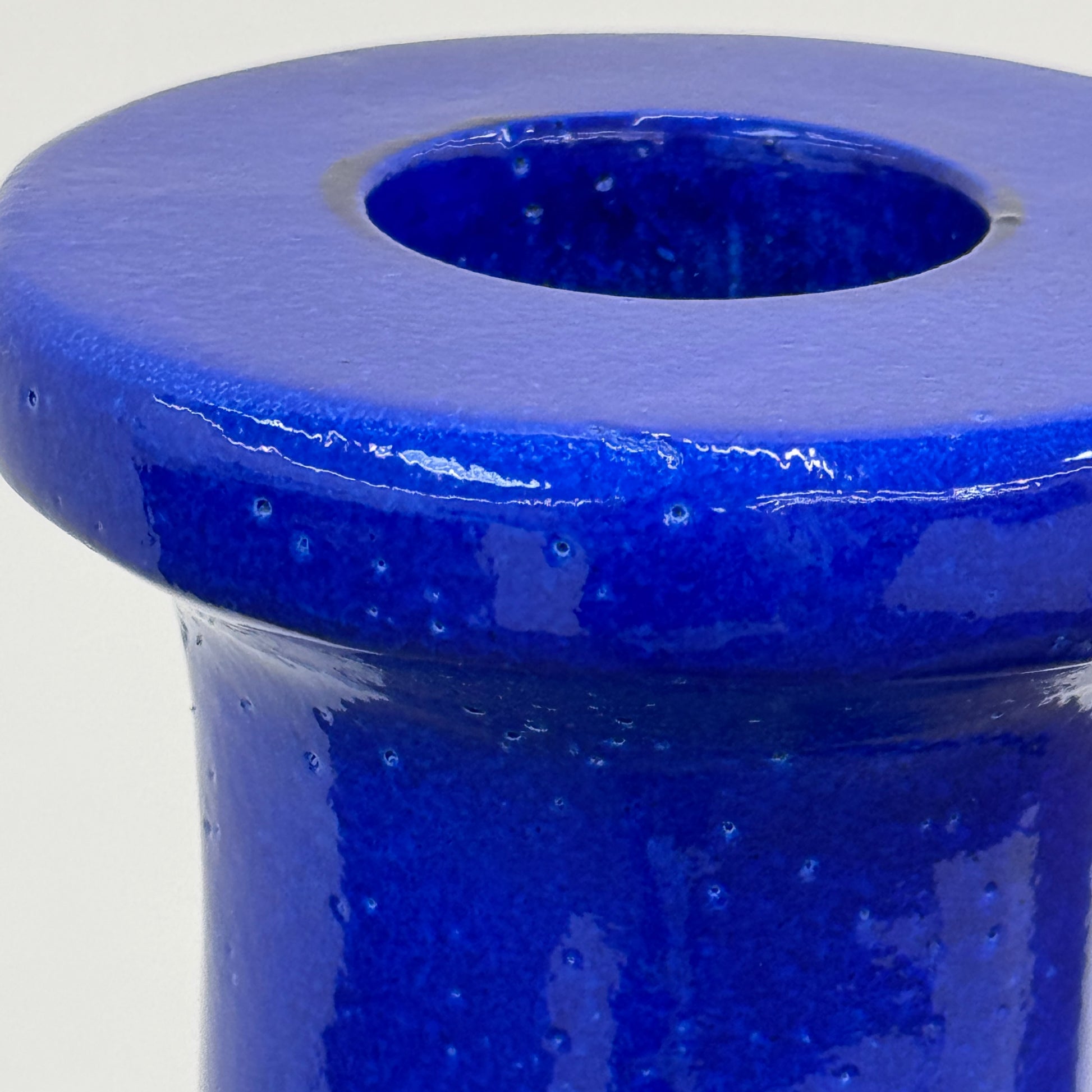 The Gervasoni In/Out Bottles, Set of 2 by Gervasoni features two glossy cobalt blue ceramic bottles of varying heights displayed side by side against a plain white background.