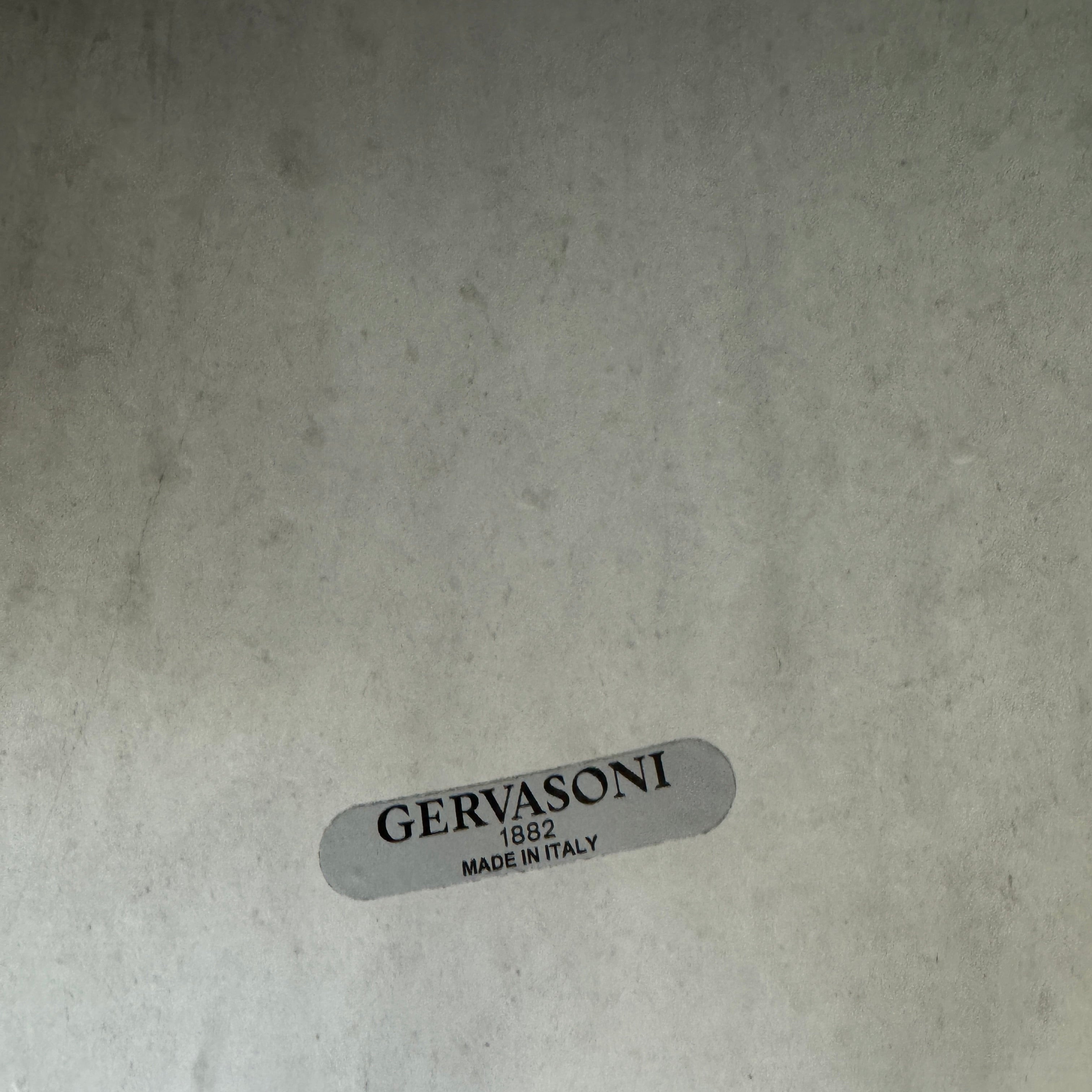 The Gervasoni In/Out Bottles, Set of 2 by Gervasoni features two glossy cobalt blue ceramic bottles of varying heights displayed side by side against a plain white background.