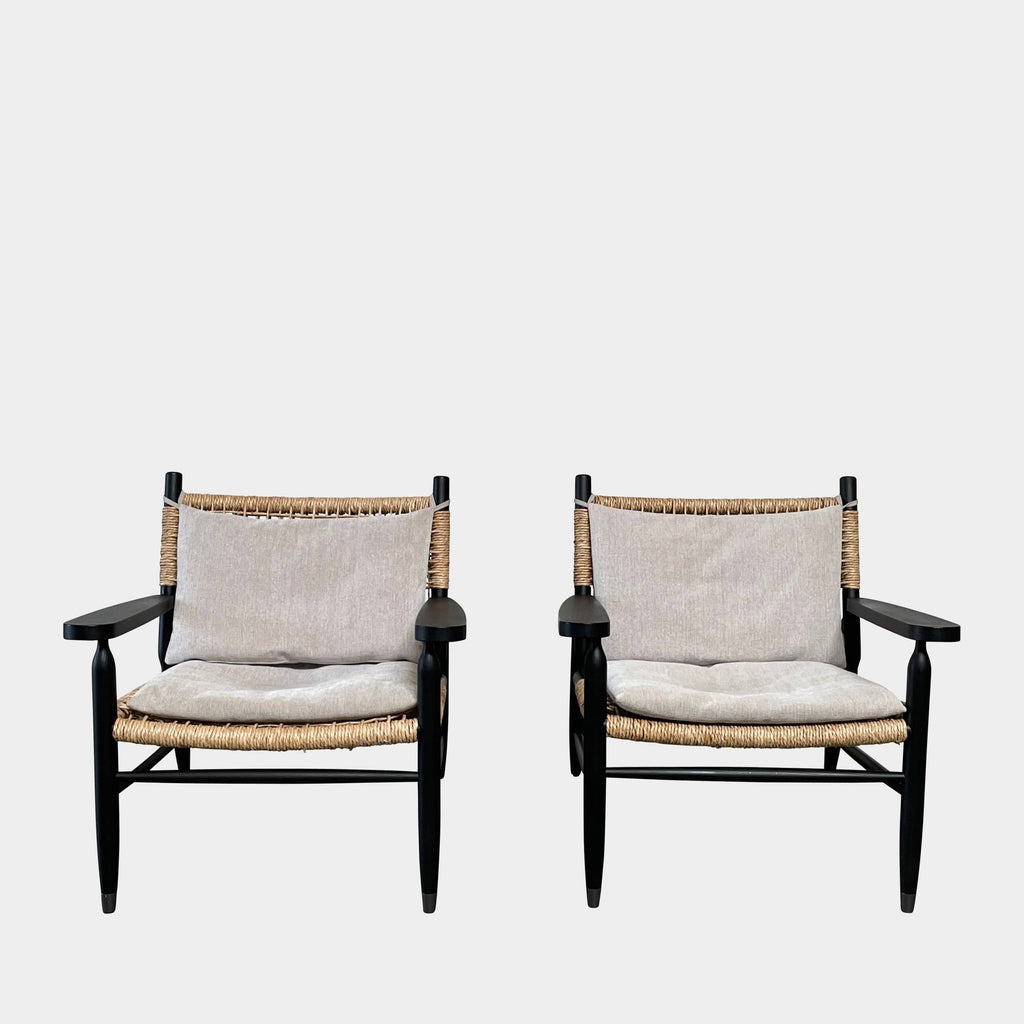 Two hand-crafted Flexform Tessa Lounge Chairs with black frames and neutral-tone cushions on a white background.