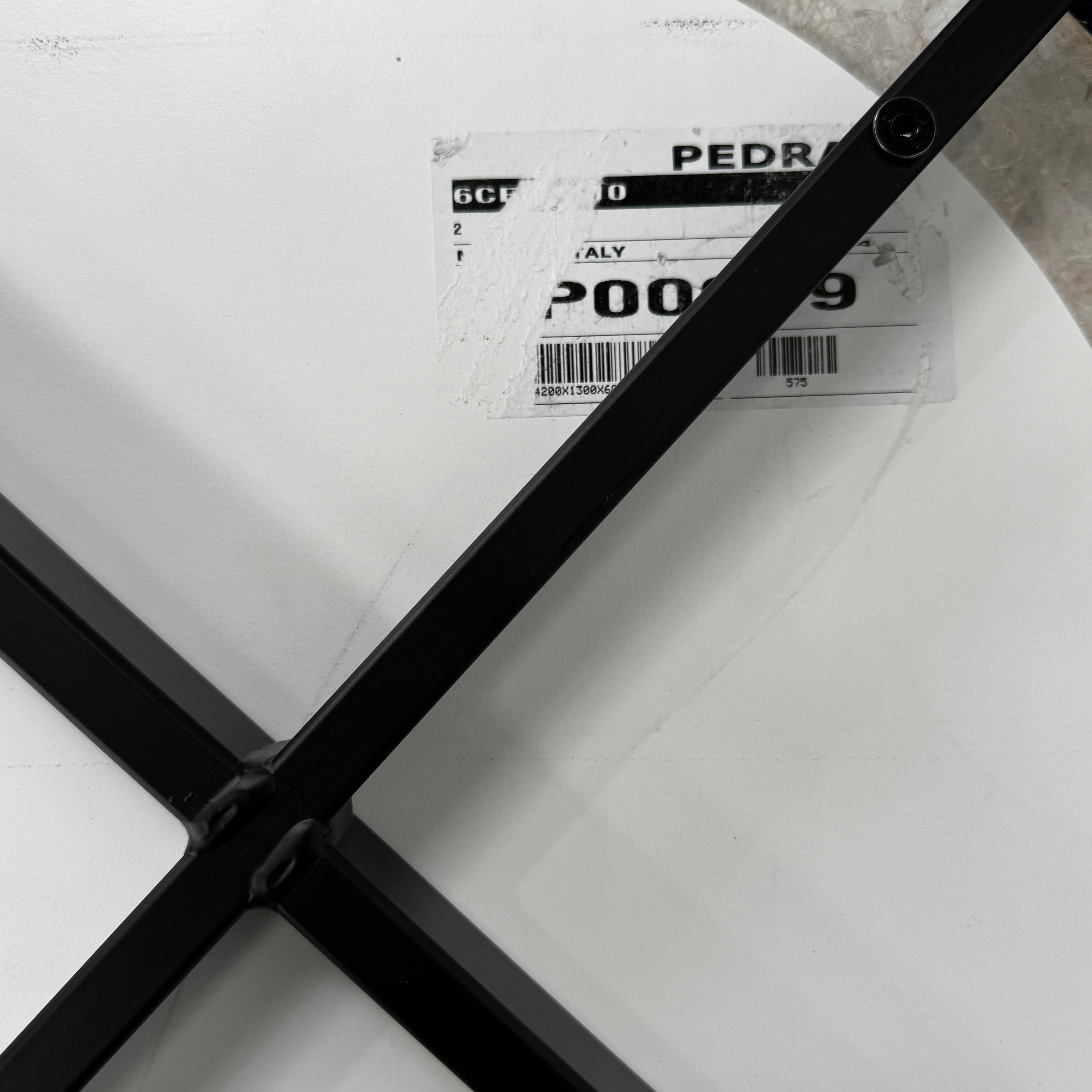 The Pedrali Blume Side Table features a round top and elegant gold legs, offering a stylish addition to any room.