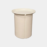 The Gervasoni Brise 43 Side Table by Gervasoni features a beige, cylindrical shape with a wide, subtly flared rim and a vertical seam, evoking Art Nouveau influences, shown against a plain white background.