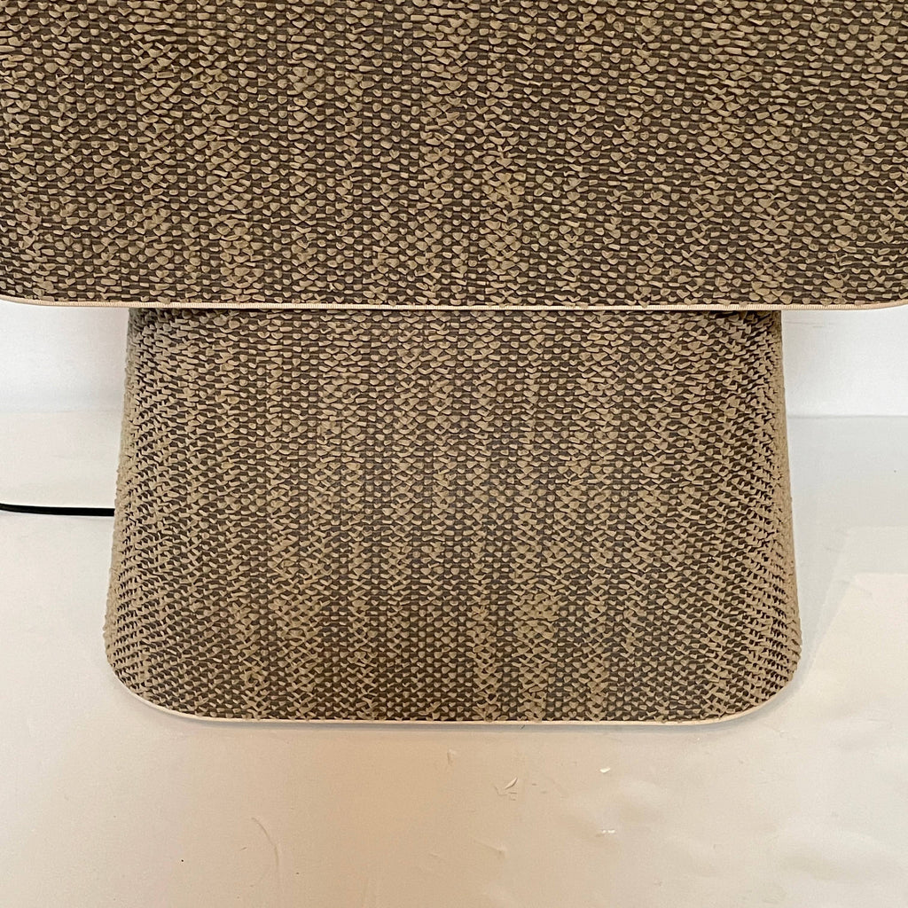 Two-tiered, textured fabric lampshade with a loop finial on a white background for the Luminara Dabliu Table Light by Luminara.