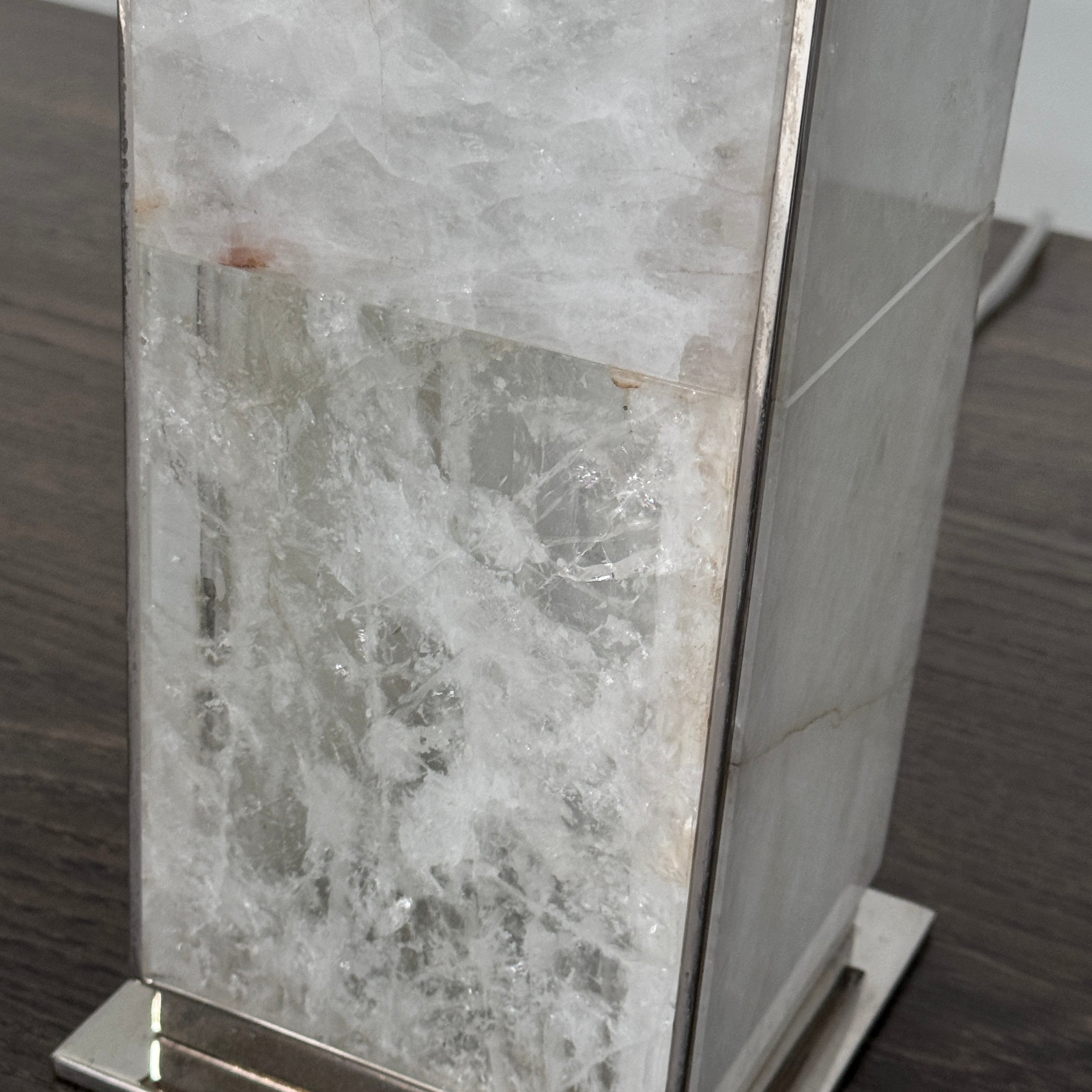 The Visual Comfort Ellis Quartz Table Lamp by Ralph Lauren features a rectangular white shade and a translucent, textured quartz base, shown against a plain white background.