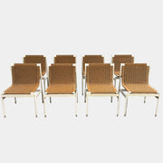 Nine MillerKnoll Sommer Outdoor Dining Chairs for DWR, sold in sets of 2, with metal frames and weatherproof wicker seats and backs, are arranged in three rows against a plain white background.