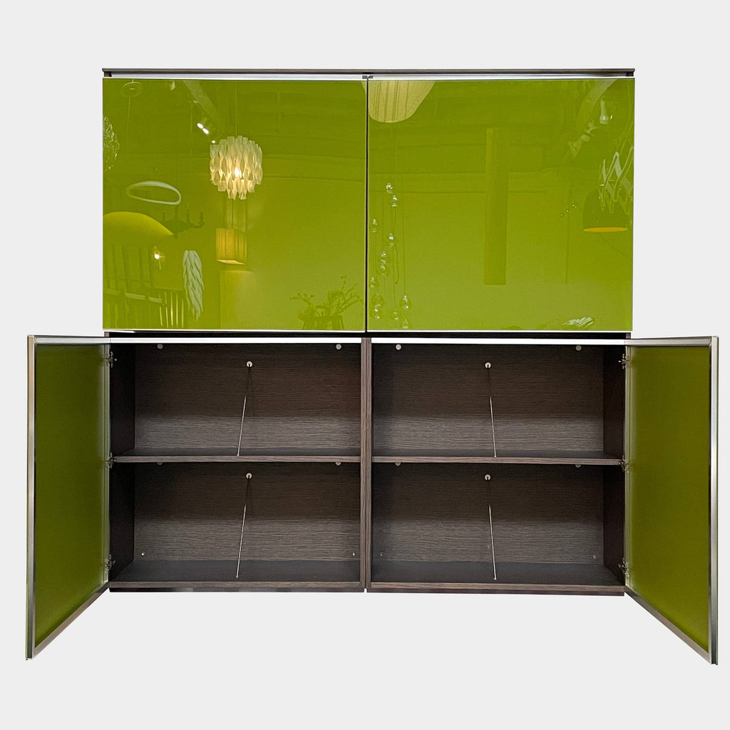 A B&B Italia Pab Wall Storage Unit in green lacquer in a room with black furniture.