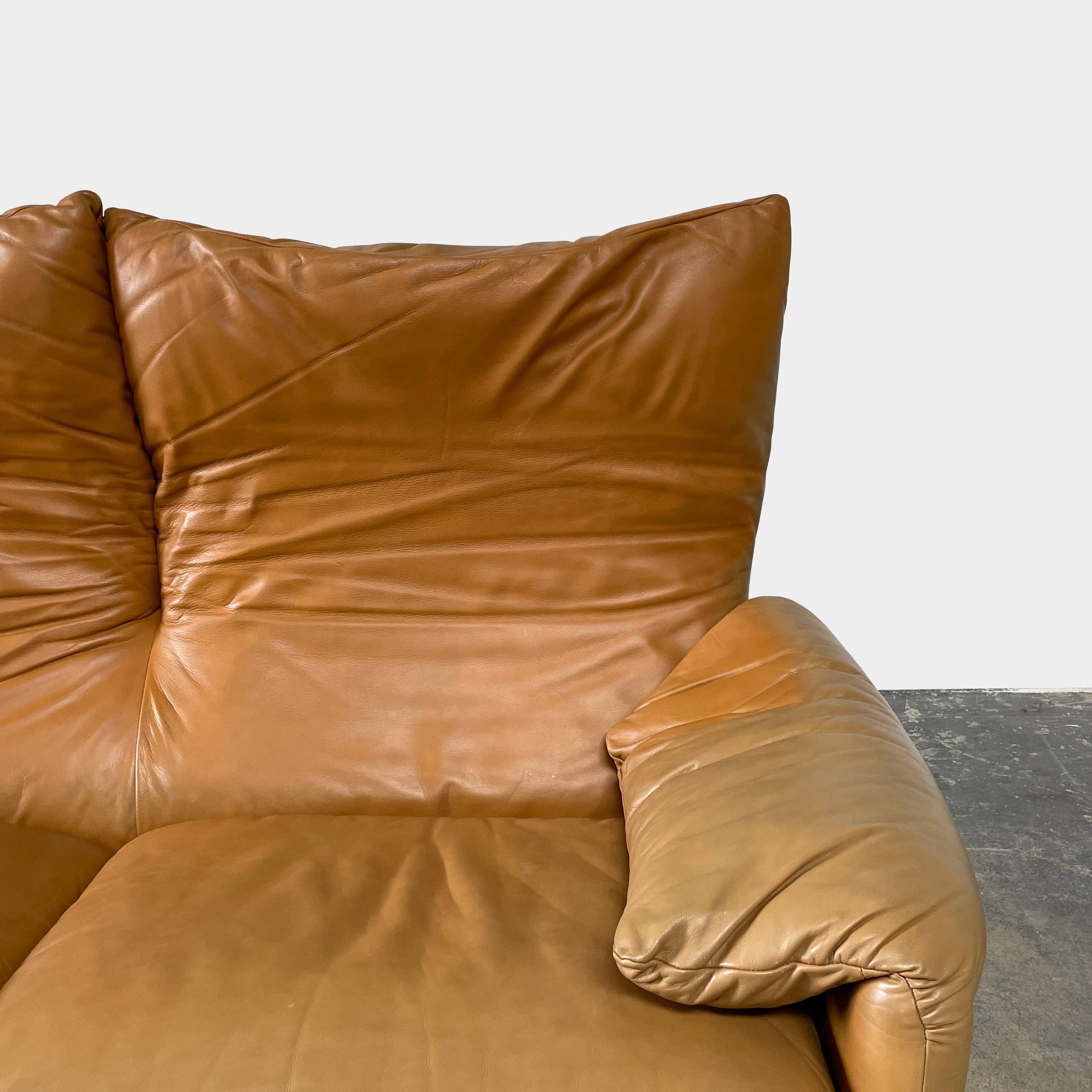 A Cassina Maralunga Two Seater sofa on a white background.