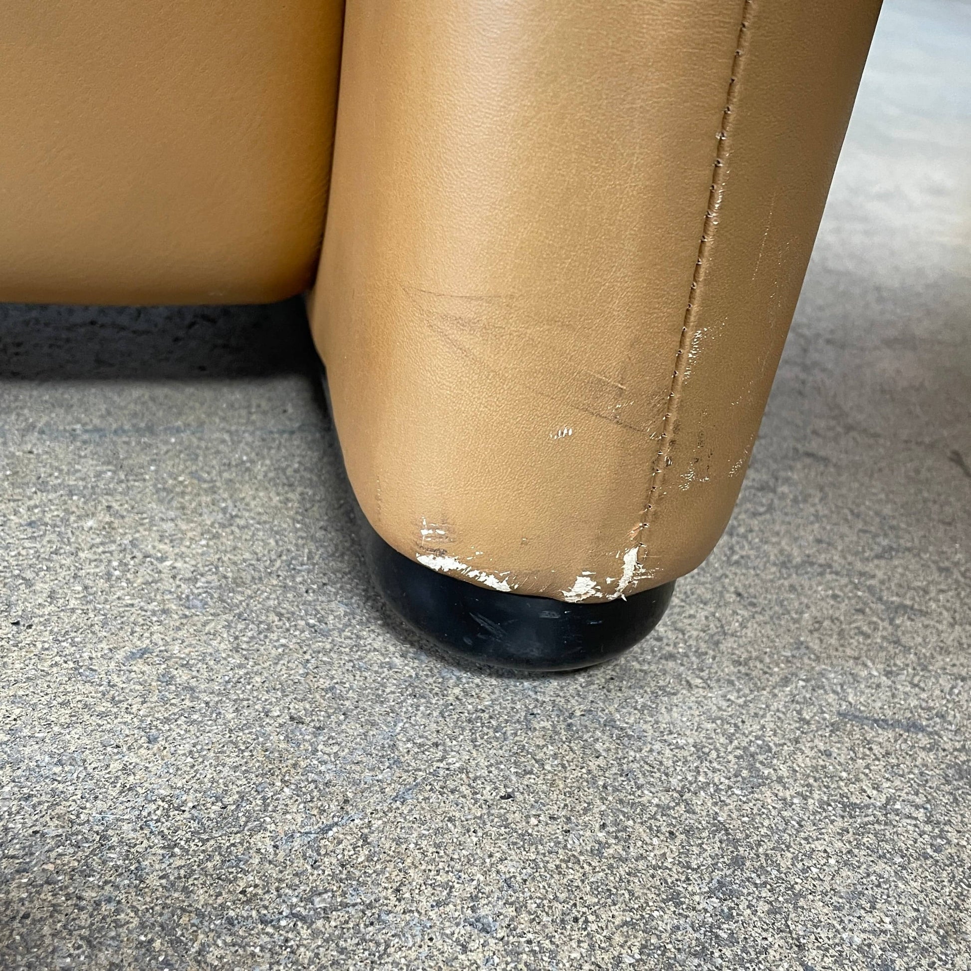 A Cassina Maralunga Two Seater sofa on a white background.