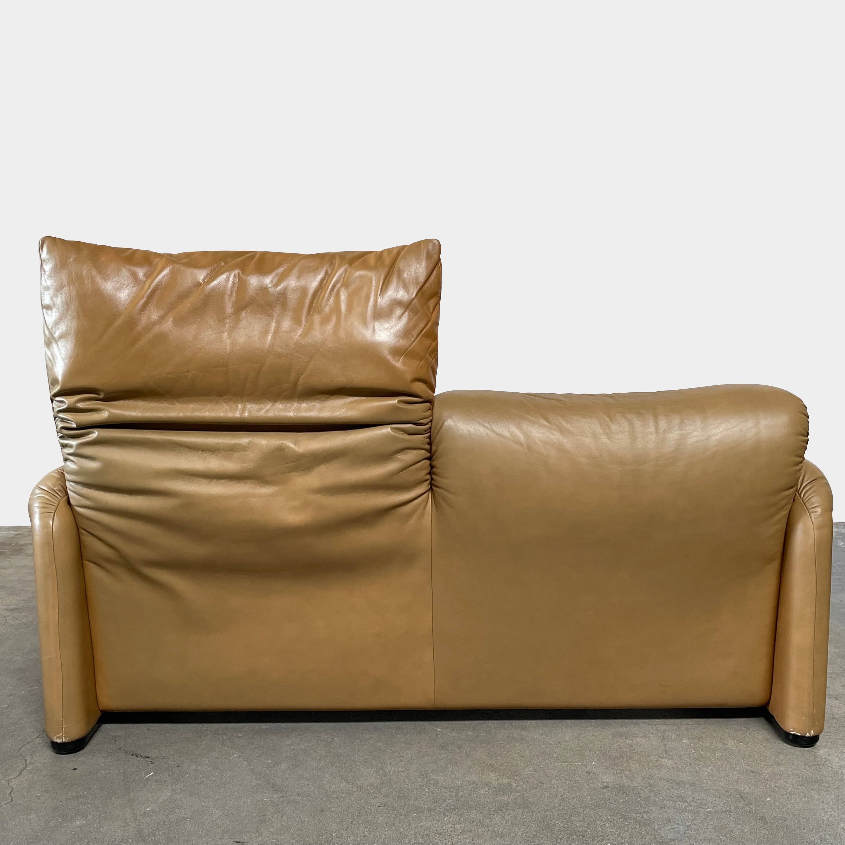 A Cassina Maralunga Two Seater sofa on a white background.