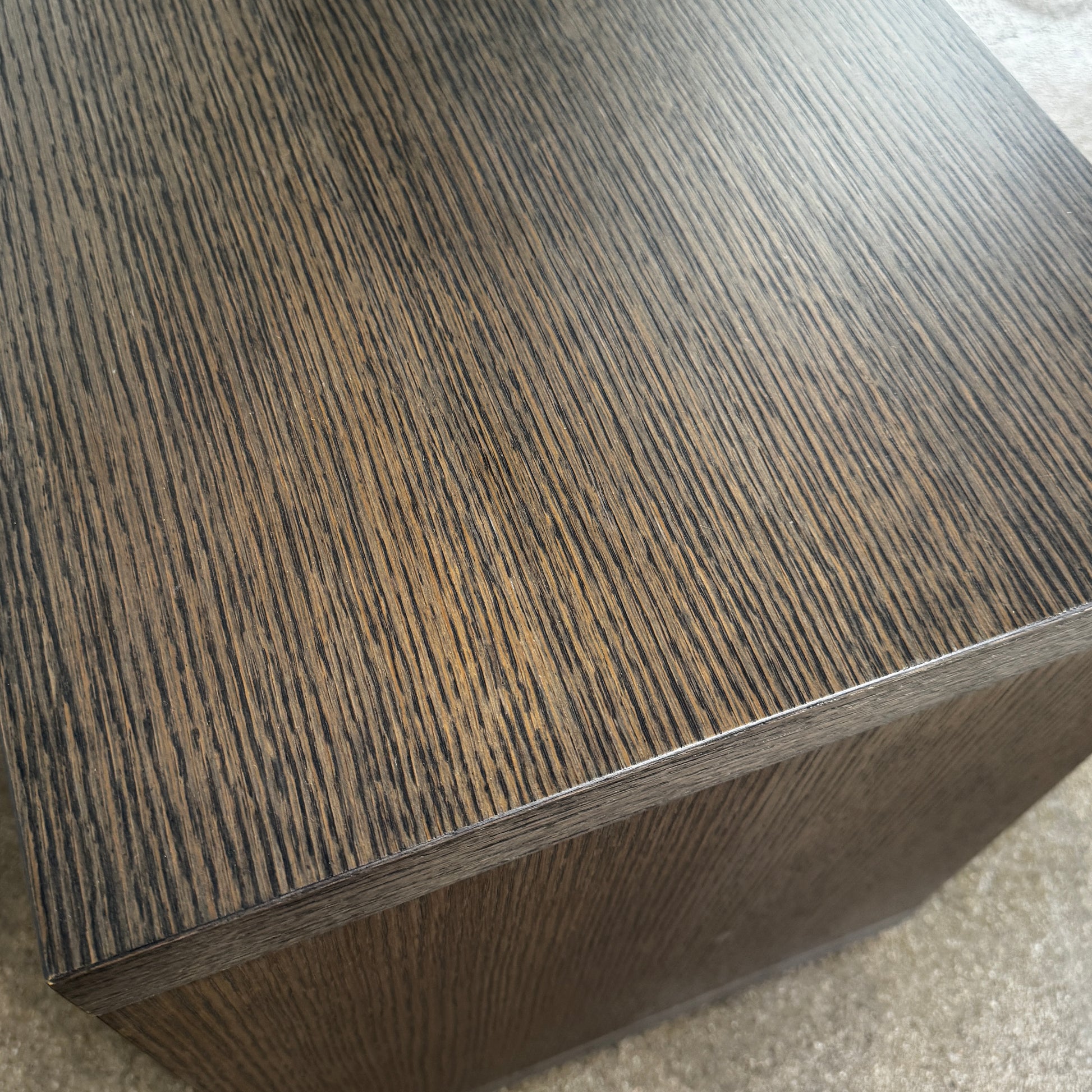 The B&B Italia Frank Low Console Table by B&B Italia features a rectangular, low-profile design with an open base and red interior shelf, shown against a plain white background.