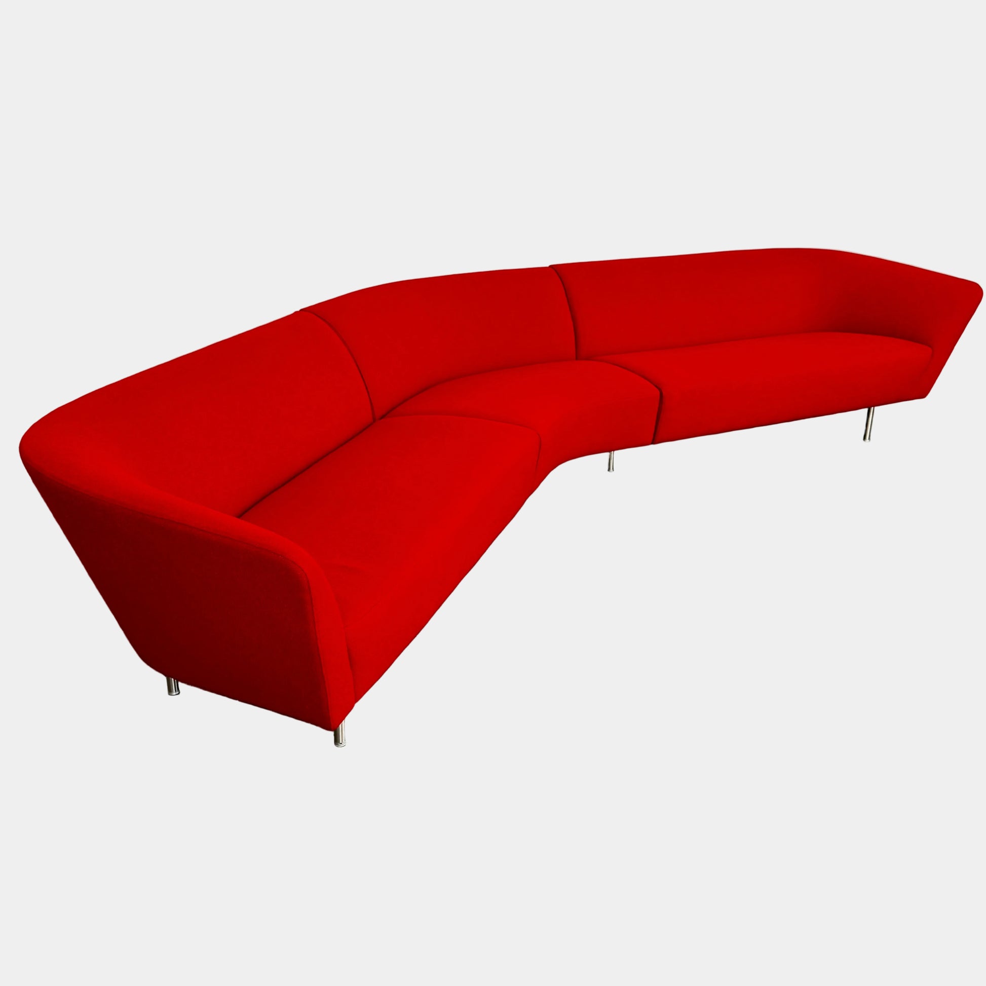 The Arper Loop Modular Sofa by Arper features a modern curved design with a geometric profile and metal legs, shown at an angle against a plain white background.