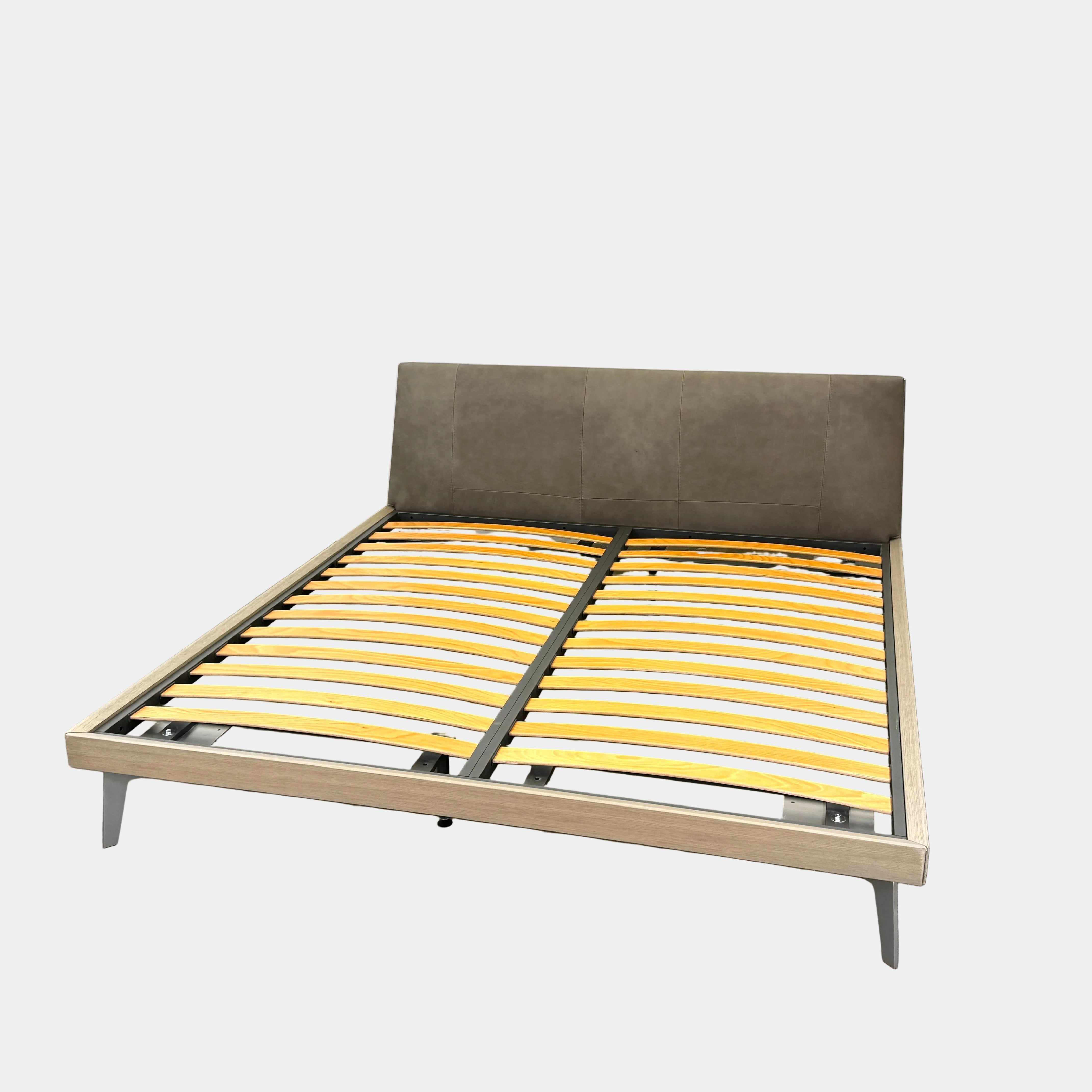 The San Giacomo Aliante King Size Bed by Sangiacomo features an upholstered headboard and exposed yellow slats, displayed on a white background. No mattress is included.
